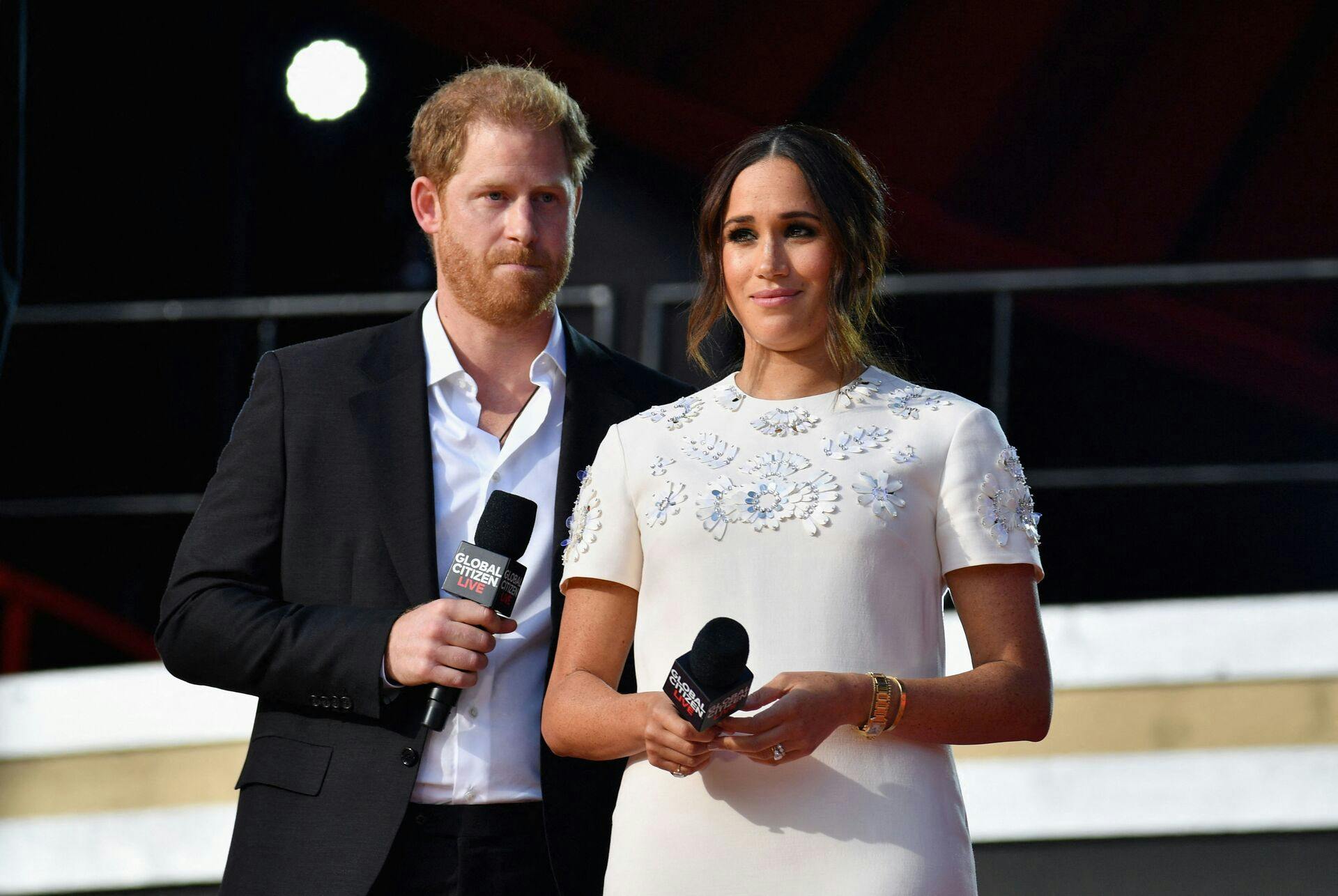 Britain's Prince Harry and Meghan Markle speak during the 2021 Global Citizen Live festival at the Great Lawn, Central Park on September 25, 2021 in New York City. (Photo by Angela Weiss / AFP)