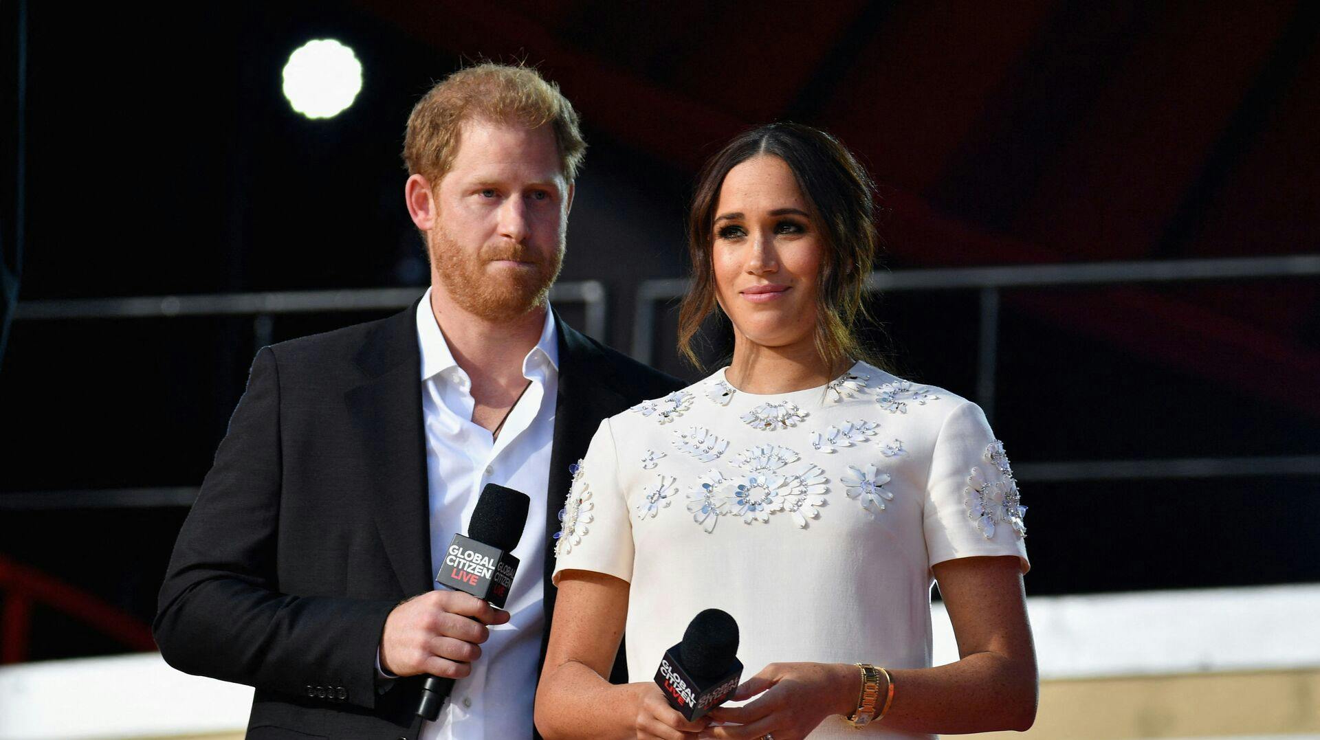 Britain's Prince Harry and Meghan Markle speak during the 2021 Global Citizen Live festival at the Great Lawn, Central Park on September 25, 2021 in New York City. (Photo by Angela Weiss / AFP)