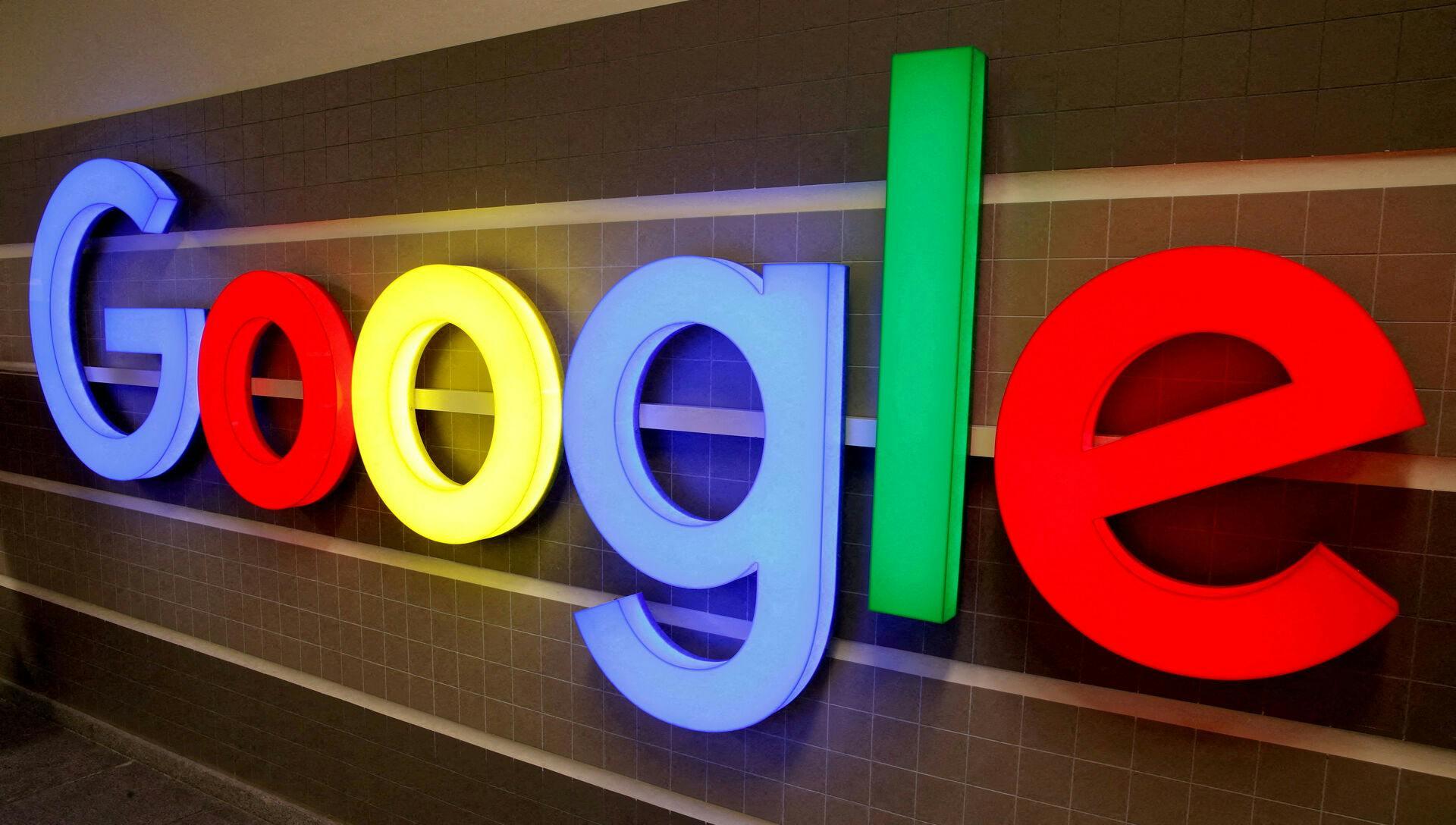 FILE PHOTO: An illuminated Google logo is seen inside an office building in Zurich, Switzerland December 5, 2018. REUTERS/Arnd Wiegmann/File Photo