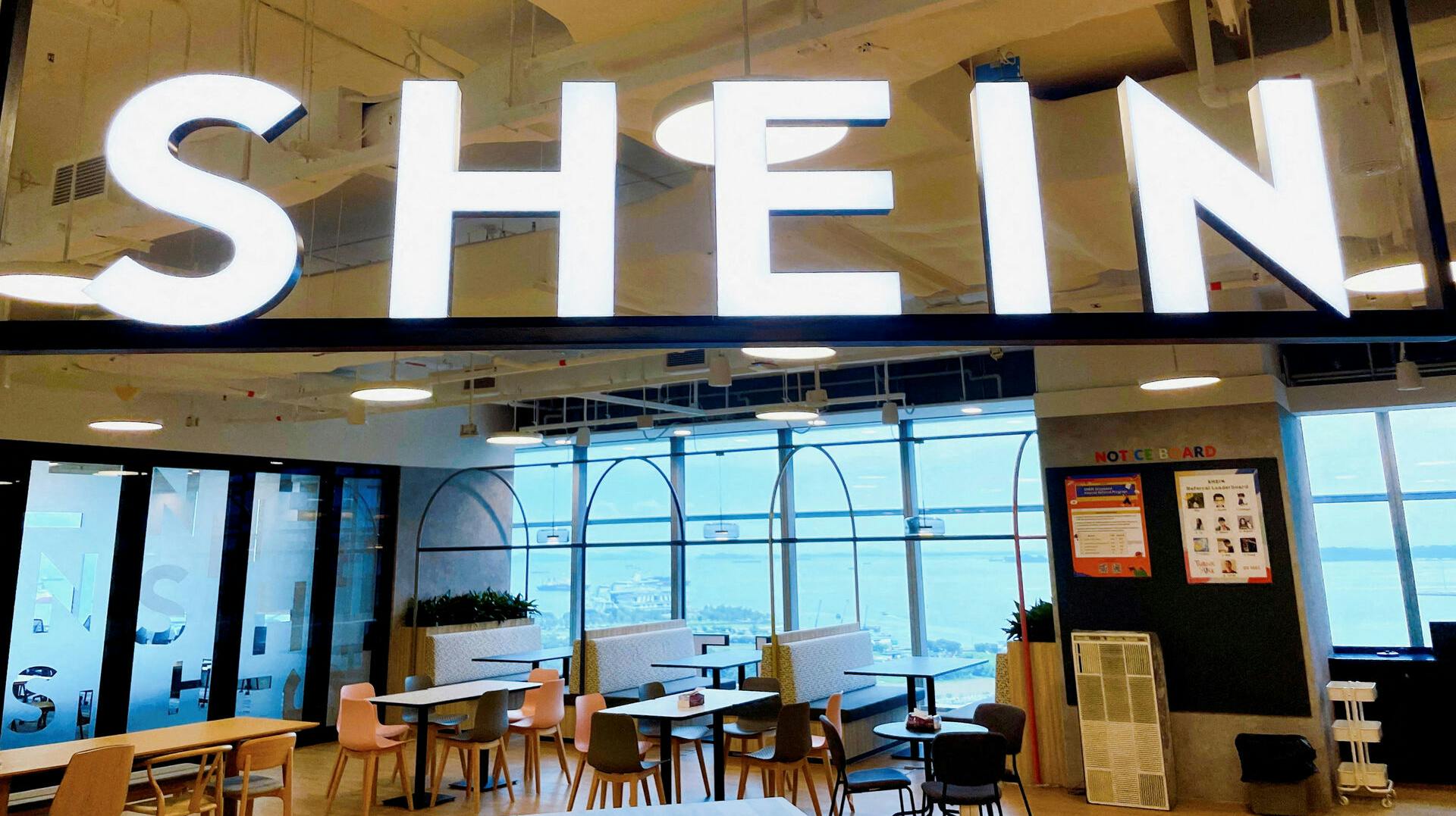 FILE PHOTO: A Shein logo is pictured at the company's office in the central business district of Singapore, October 18, 2022. REUTERS/Chen Lin/File Photo