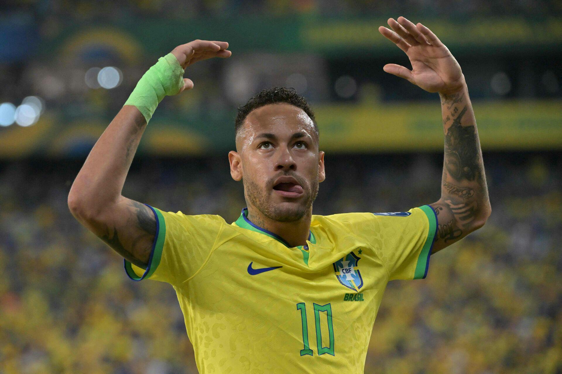 (FILES) Brazil's forward Neymar gestures during the 2026 FIFA World Cup South American qualification football match between Brazil and Venezuela at the Arena Pantanal stadium in Cuiaba, Mato Grosso State, Brazil, on October 12, 2023. Brazilian star Neymar was released on November 4, 2023, after showing a "good evolution" after undergoing knee surgery on November 2 at a hospital in Belo Horizonte, the Brazilian Football Confederation (CBF) said. (Photo by NELSON ALMEIDA / AFP)