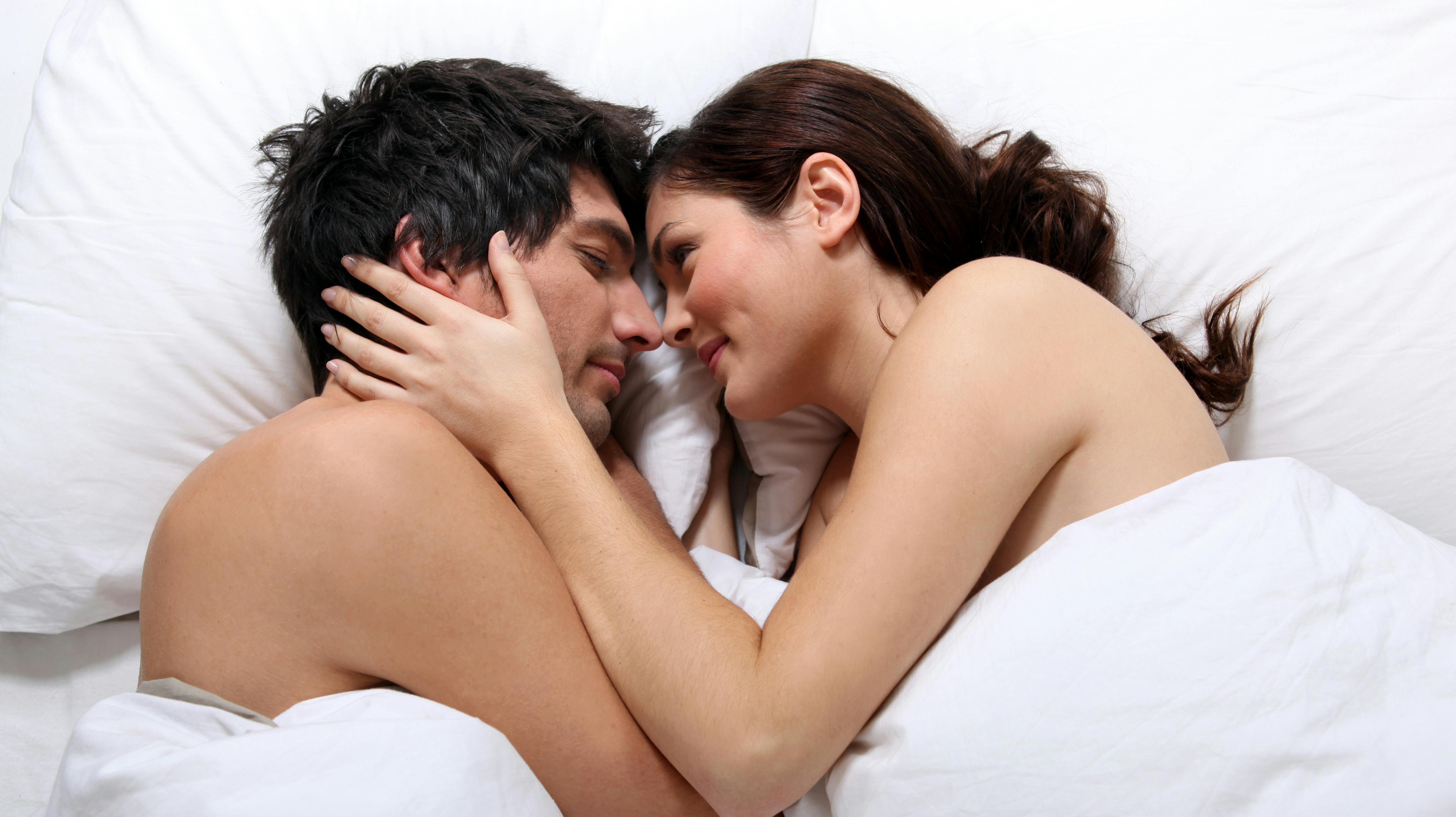 Naked couple in bed