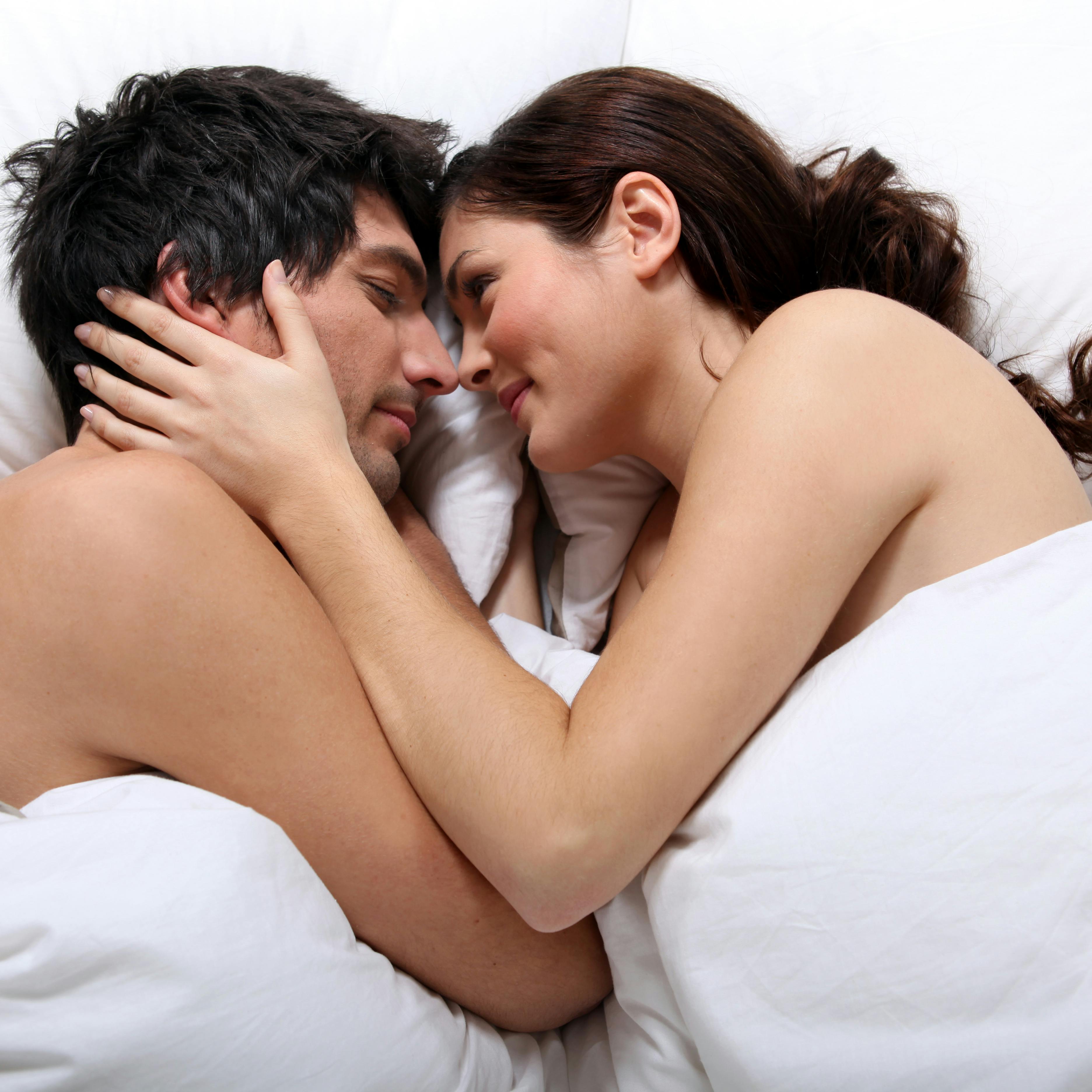 Naked couple in bed
