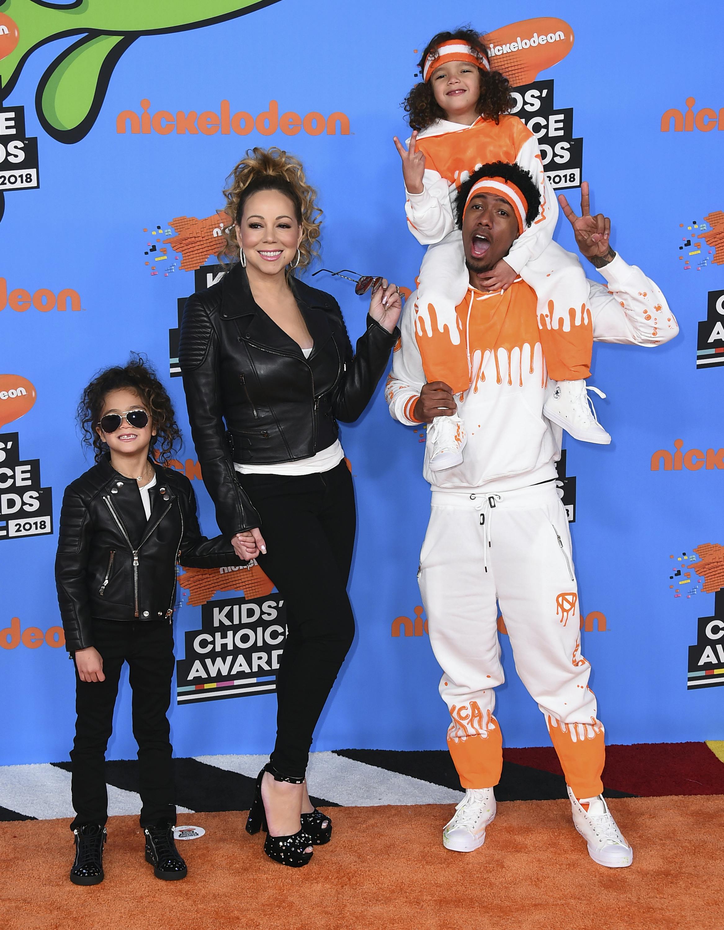 Mariah Carey, center left, Nick Cannon, center right, and from left, their children Monroe and Moroccan arrive at the Kids' Choice Awards at The Forum on Saturday, March 24, 2018, in Inglewood, Calif. (Photo by Jordan Strauss/Invision/AP)