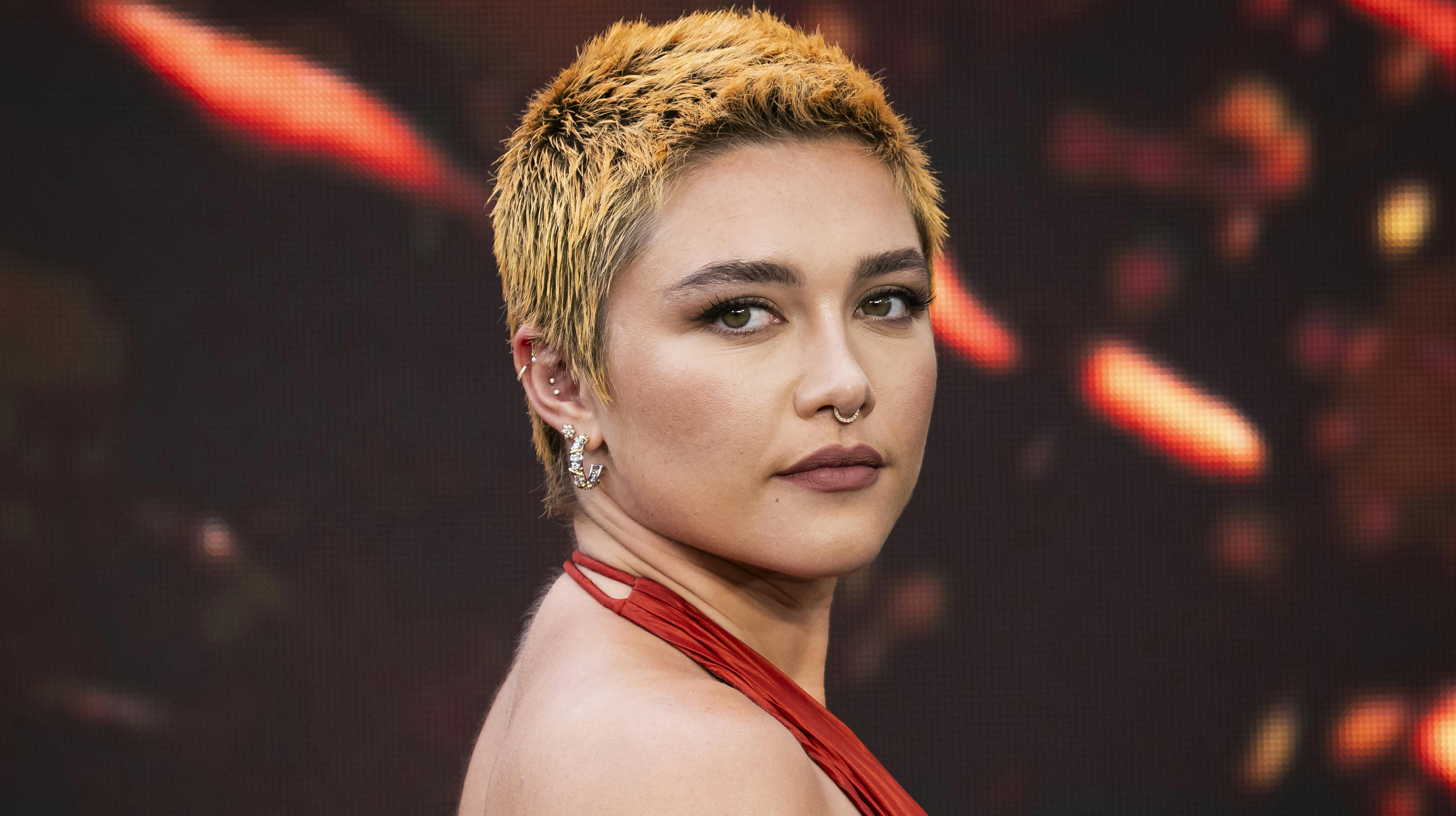 Florence Pugh poses for photographers upon arrival at the premiere of the film 'Oppenheimer' on Thursday, July 13, 2023 in London. (Scott Garfitt/Invision/AP)