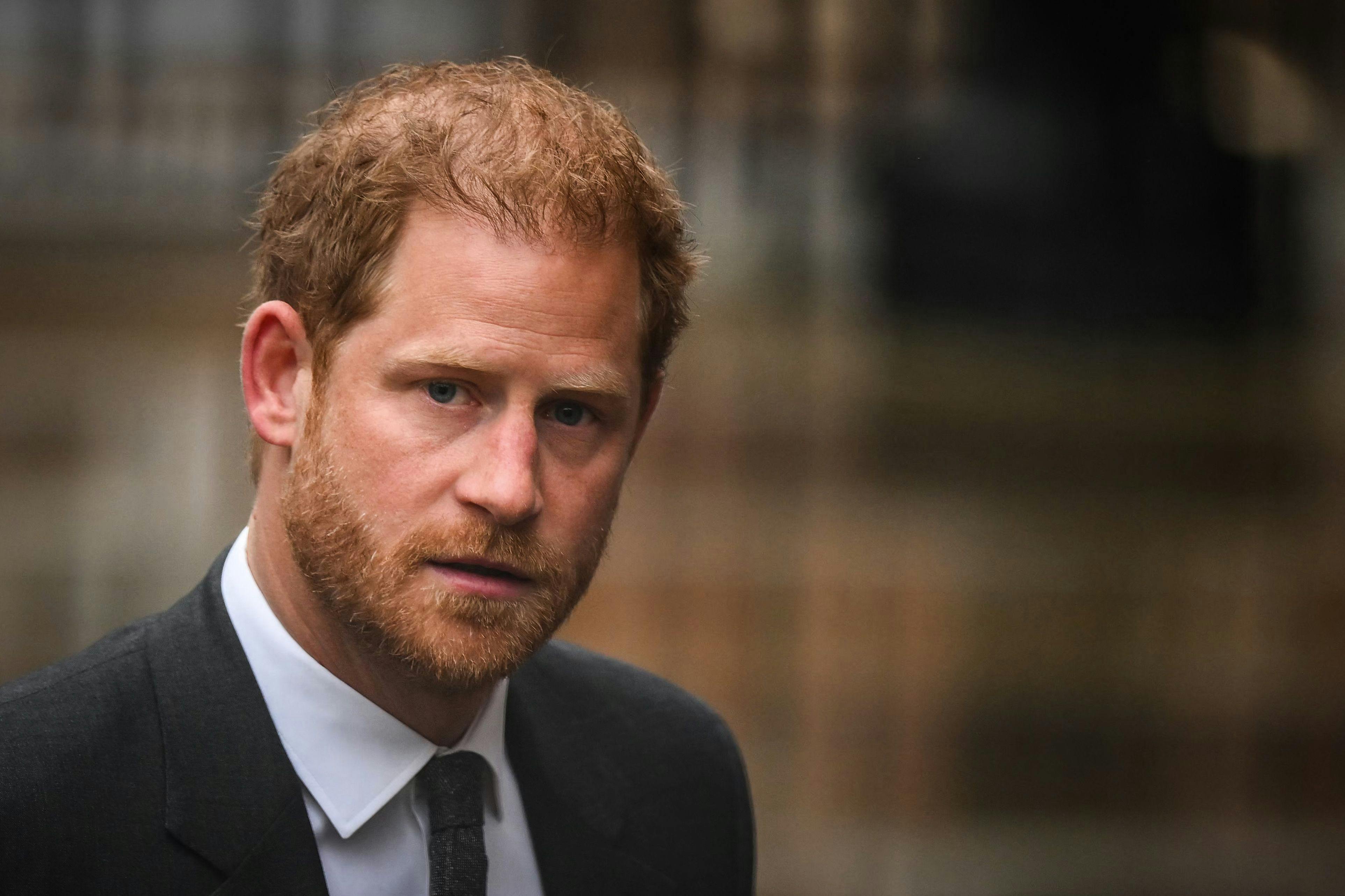 (FILES) Britain's Prince Harry, Duke of Sussex arrives at the Royal Courts of Justice, Britain's High Court, in central London on March 28, 2023. Lawyers for Prince Harry on December 5 began a legal challenge over his security arrangements in the UK, after he quit frontline royal duties and moved to North America. The case about his loss of UK taxpayer-funded protection is the latest in a string of court proceedings initiated by Harry, whose father is King Charles III. (Photo by Daniel LEAL / AFP)