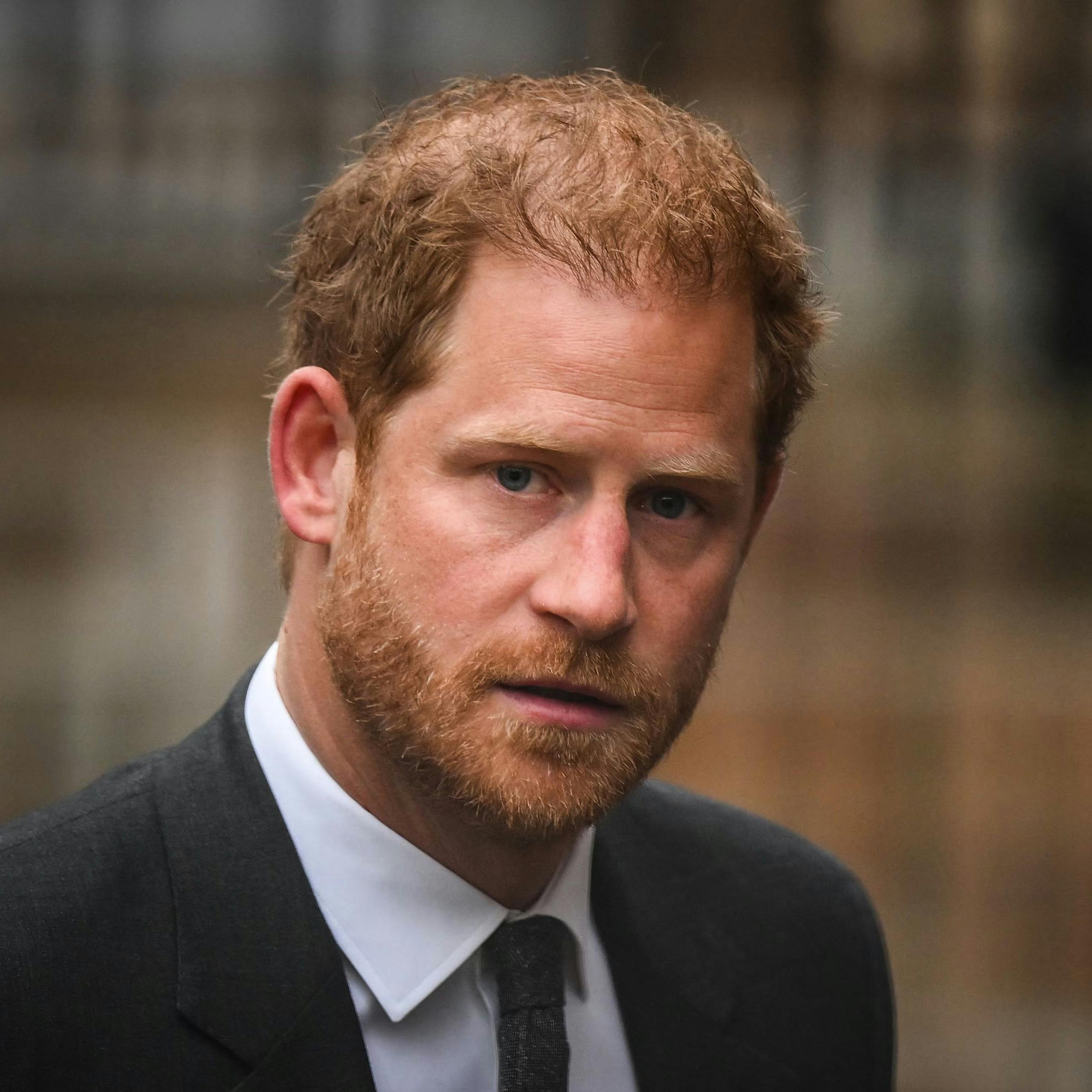 (FILES) Britain's Prince Harry, Duke of Sussex arrives at the Royal Courts of Justice, Britain's High Court, in central London on March 28, 2023. Lawyers for Prince Harry on December 5 began a legal challenge over his security arrangements in the UK, after he quit frontline royal duties and moved to North America. The case about his loss of UK taxpayer-funded protection is the latest in a string of court proceedings initiated by Harry, whose father is King Charles III. (Photo by Daniel LEAL / AFP)