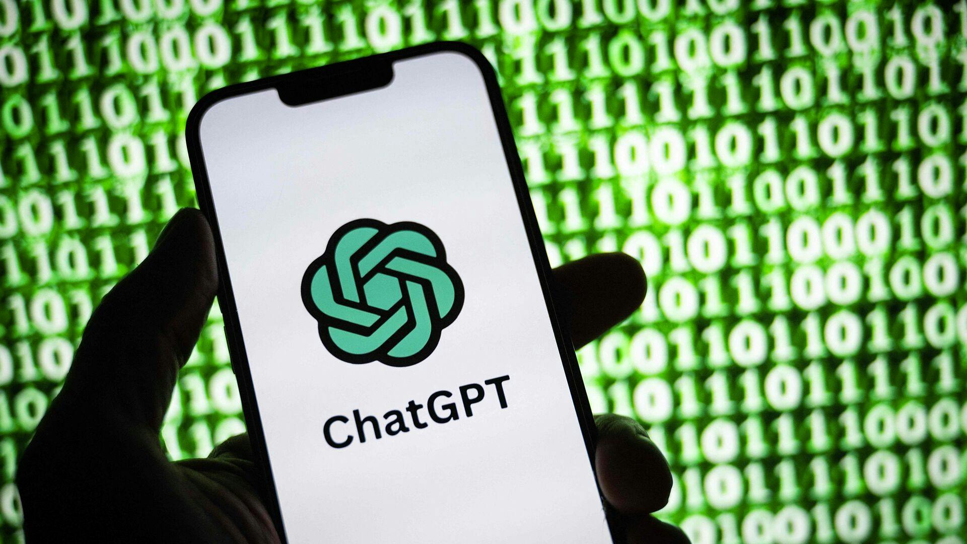 (FILES) This illustration photograph taken on October 30, 2023, shows the logo of ChatGPT, a language model-based chatbot developed by OpenAI, on a smartphone in Mulhouse, eastern France. Hundreds of staff at ChatGPT's parent company OpenAI have signed a letter threatening to leave the tech firm unless "all current board members resign, " according to US media reports on November 20, 2023. (Photo by SEBASTIEN BOZON / AFP)