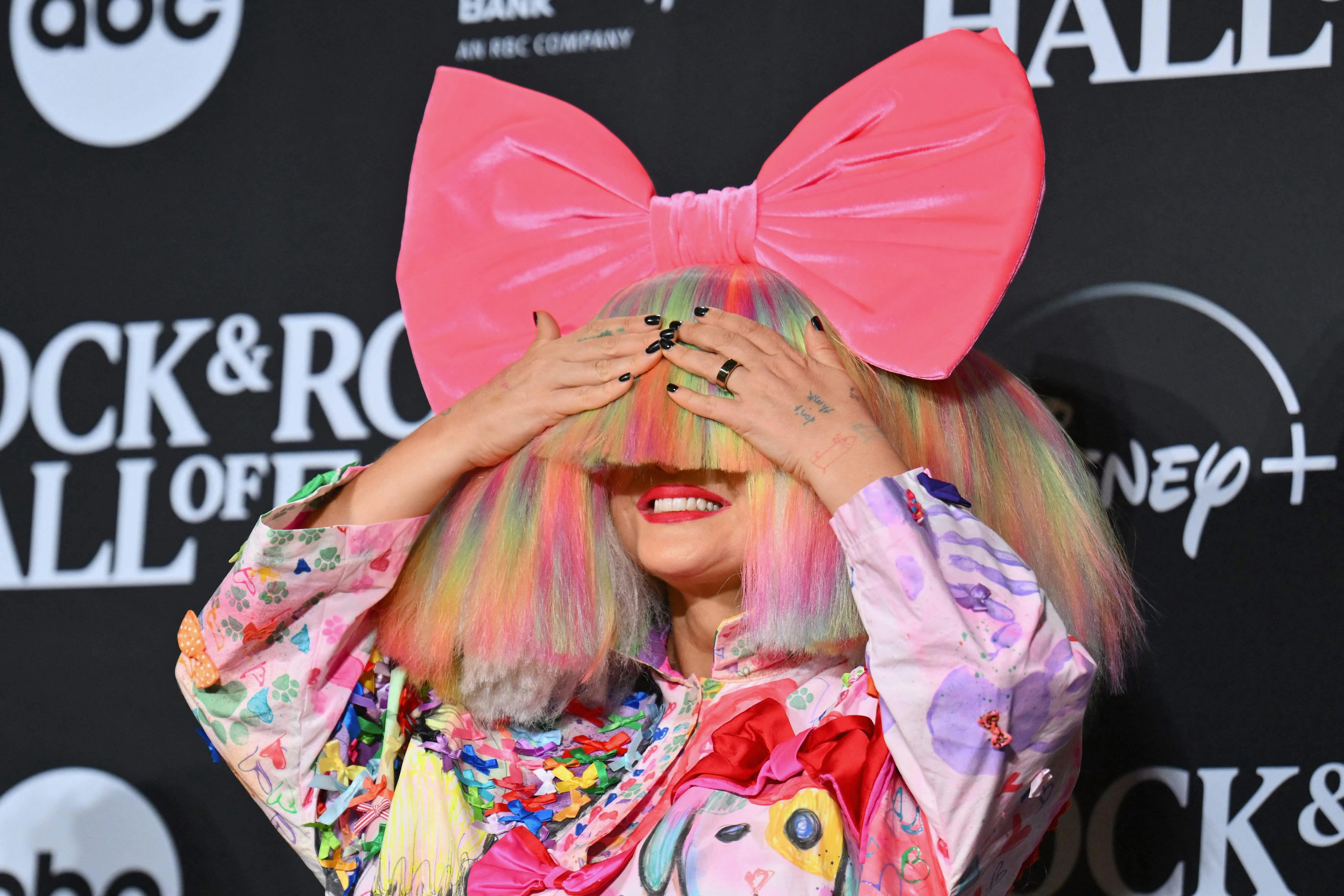 TOPSHOT - Australian singer-songwriter Sia poses in the press room during the 38th Annual Rock & Roll Hall of Fame Induction Ceremony at Barclays Center in the Brooklyn borough of New York City on November 3, 2023. (Photo by ANGELA WEISS / AFP)