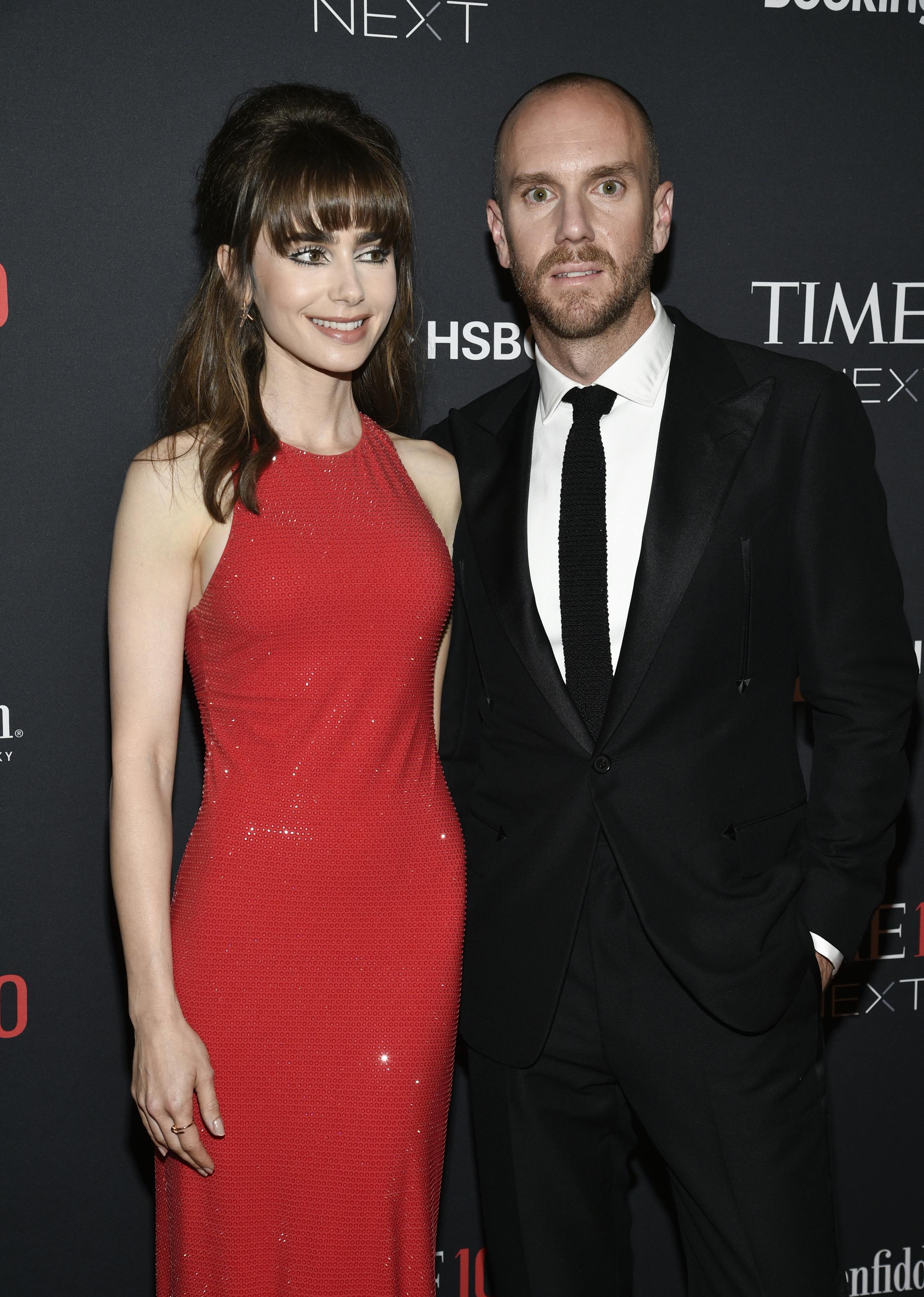 Lily Collins, left, and husband Charlie McDowell attend the Time100 Next list celebrating the 100 rising stars who are shaping the future of their fields at SECOND on Tuesday, Oct. 25, 2022, in New York. (Photo by Evan Agostini/Invision/AP)