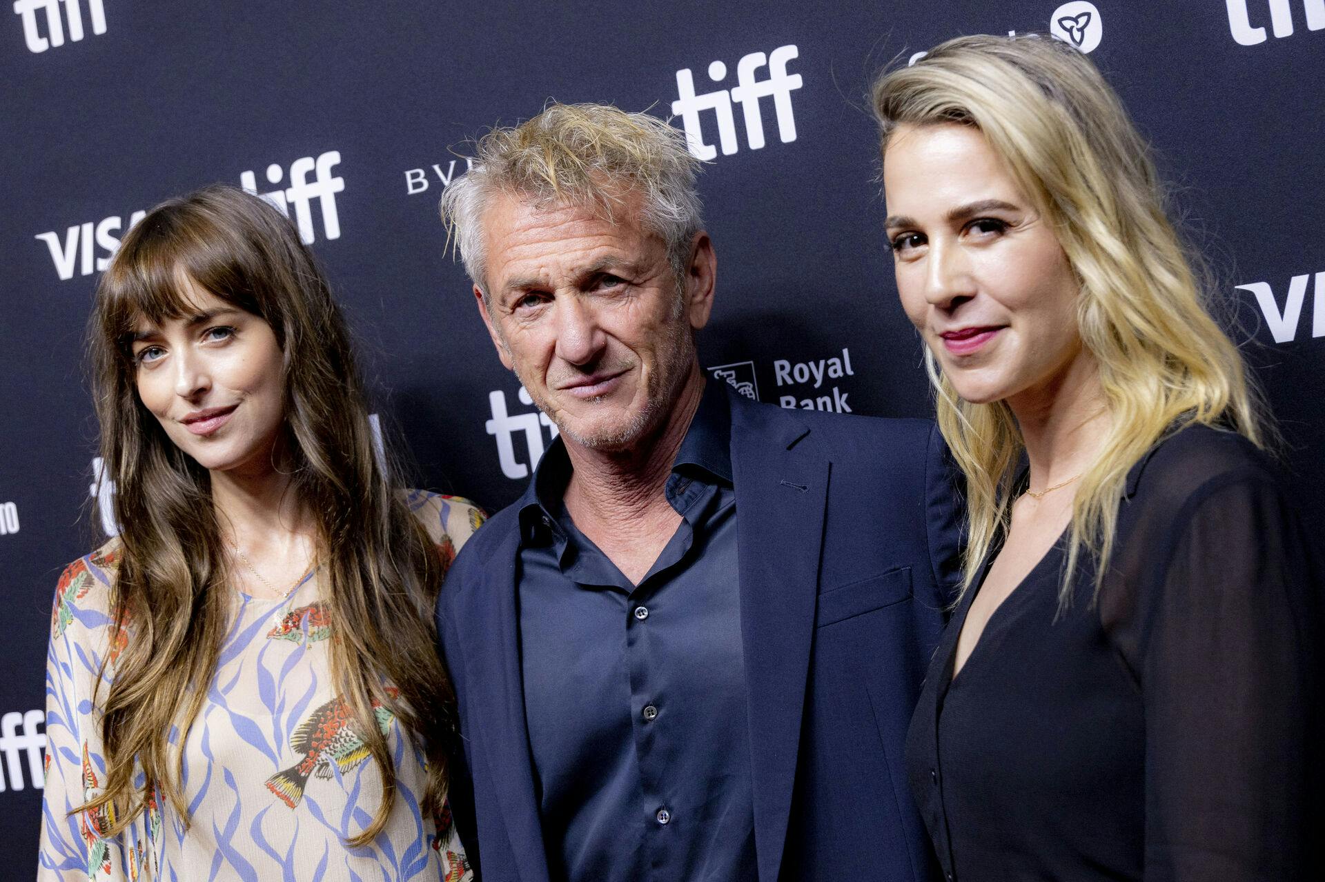 Dakota Johnson, from left to right, Sean Penn and Christy Hall attend the premiere of "Daddio" at the TIFF Bell Lightbox during the Toronto International Film Festival, Sunday, Sept. 10, 2023, in Toronto. (Photo by Joel C Ryan/Invision/AP)