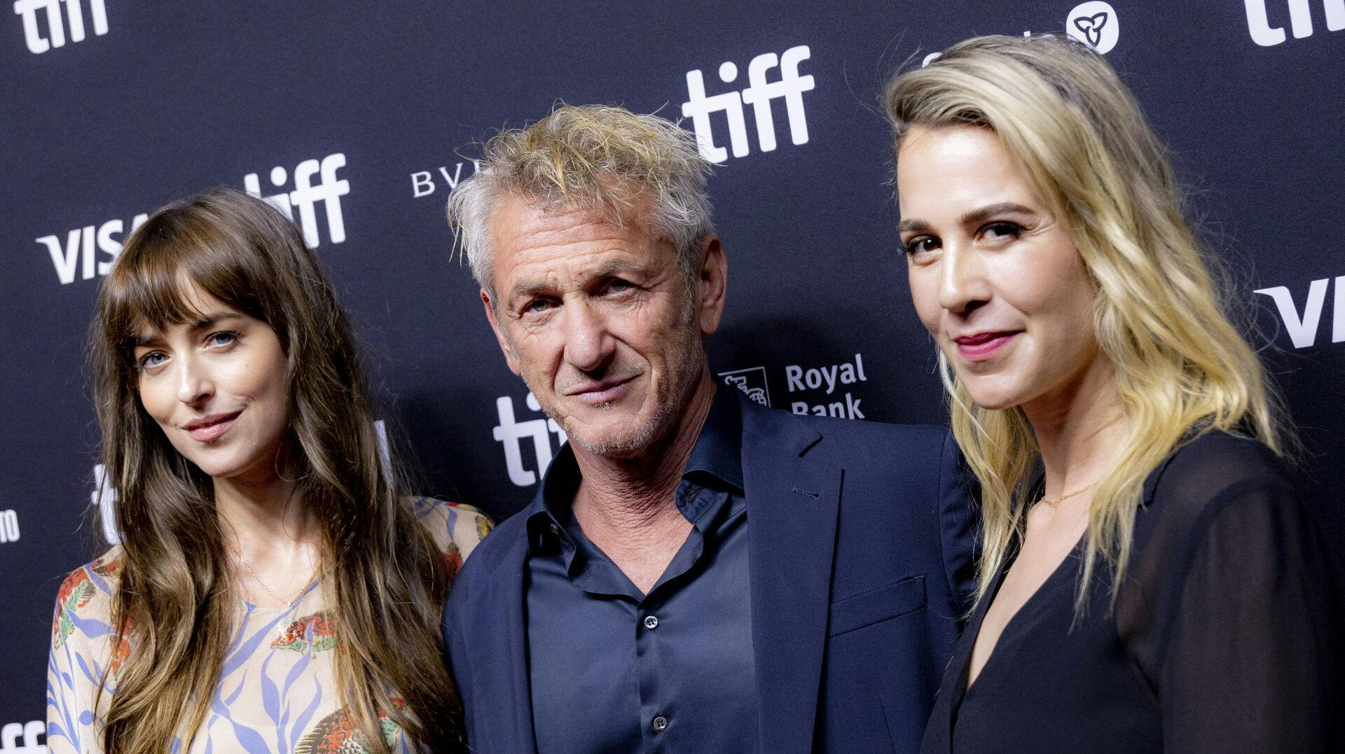 Dakota Johnson, from left to right, Sean Penn and Christy Hall attend the premiere of "Daddio" at the TIFF Bell Lightbox during the Toronto International Film Festival, Sunday, Sept. 10, 2023, in Toronto. (Photo by Joel C Ryan/Invision/AP)