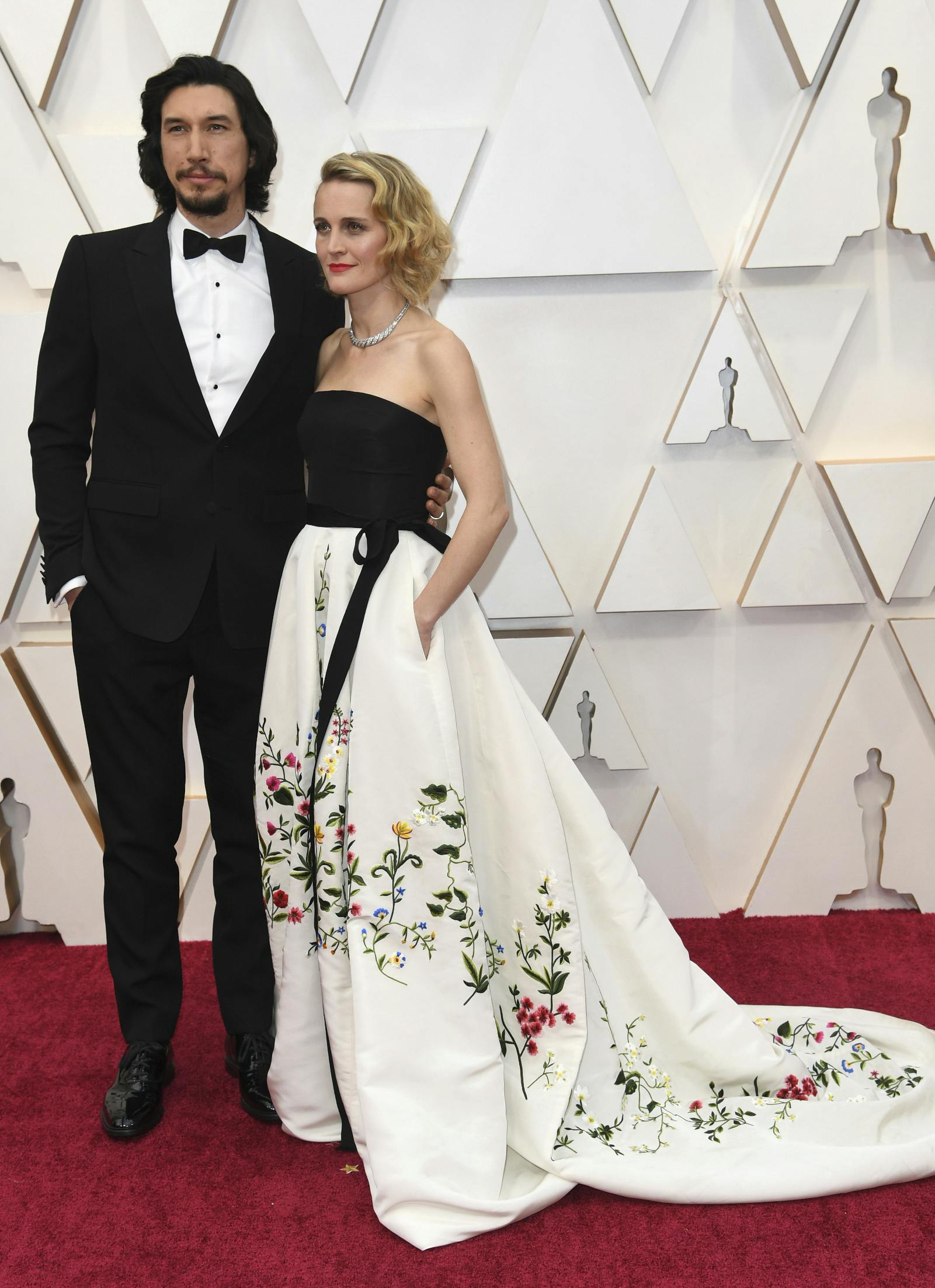 Adam Driver, left, and Joanne Tucker arrive at the Oscars on Sunday, Feb. 9, 2020, at the Dolby Theatre in Los Angeles. (Photo by Richard Shotwell/Invision/AP)