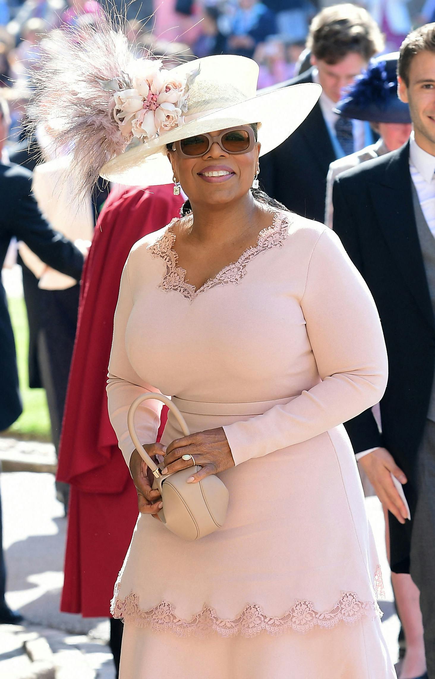 US presenter Oprah Winfrey arrives for the wedding ceremony of Britain's Prince Harry, Duke of Sussex and US actress Meghan Markle at St George's Chapel, Windsor Castle, in Windsor, on May 19, 2018. Ian West / POOL / AFP