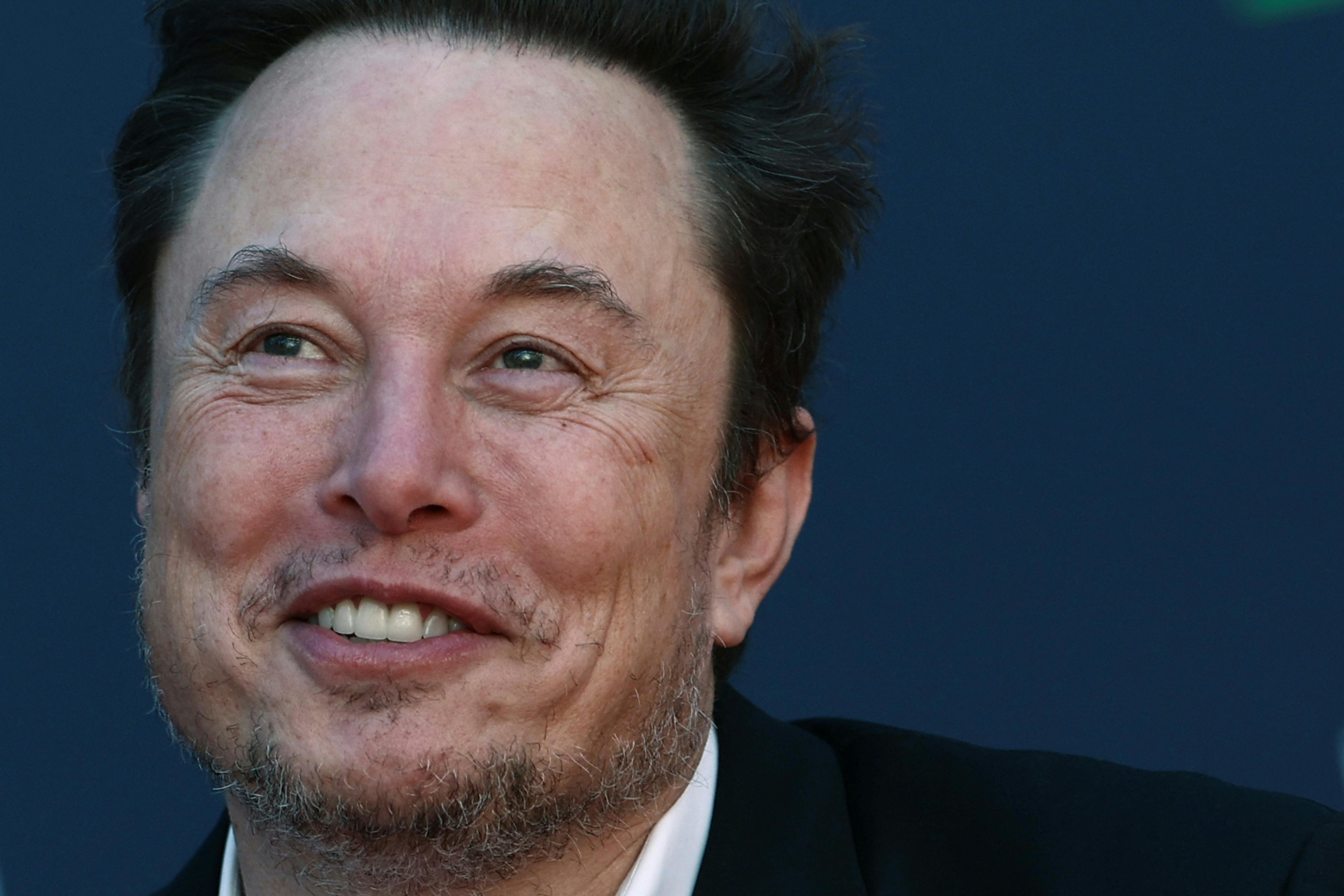 Tesla and SpaceX's CEO Elon Musk reacts, as he attends political festival Atreju organised by Italian Prime Minister Giorgia Meloni's Brothers of Italy (Fratelli d'Italia) right-wing party, in Rome, Italy, December 16, 2023. REUTERS/Guglielmo Mangiapane