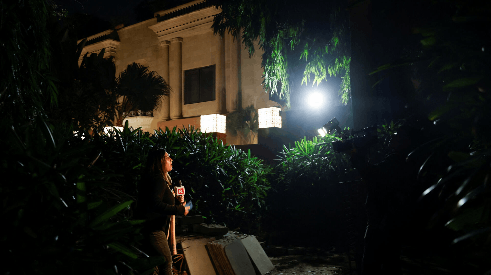 A reporter works outside the Israeli embassy, following a reported explosion nearby, in New Delhi, India, December 26, 2023. REUTERS/Anushree Fadnavis
