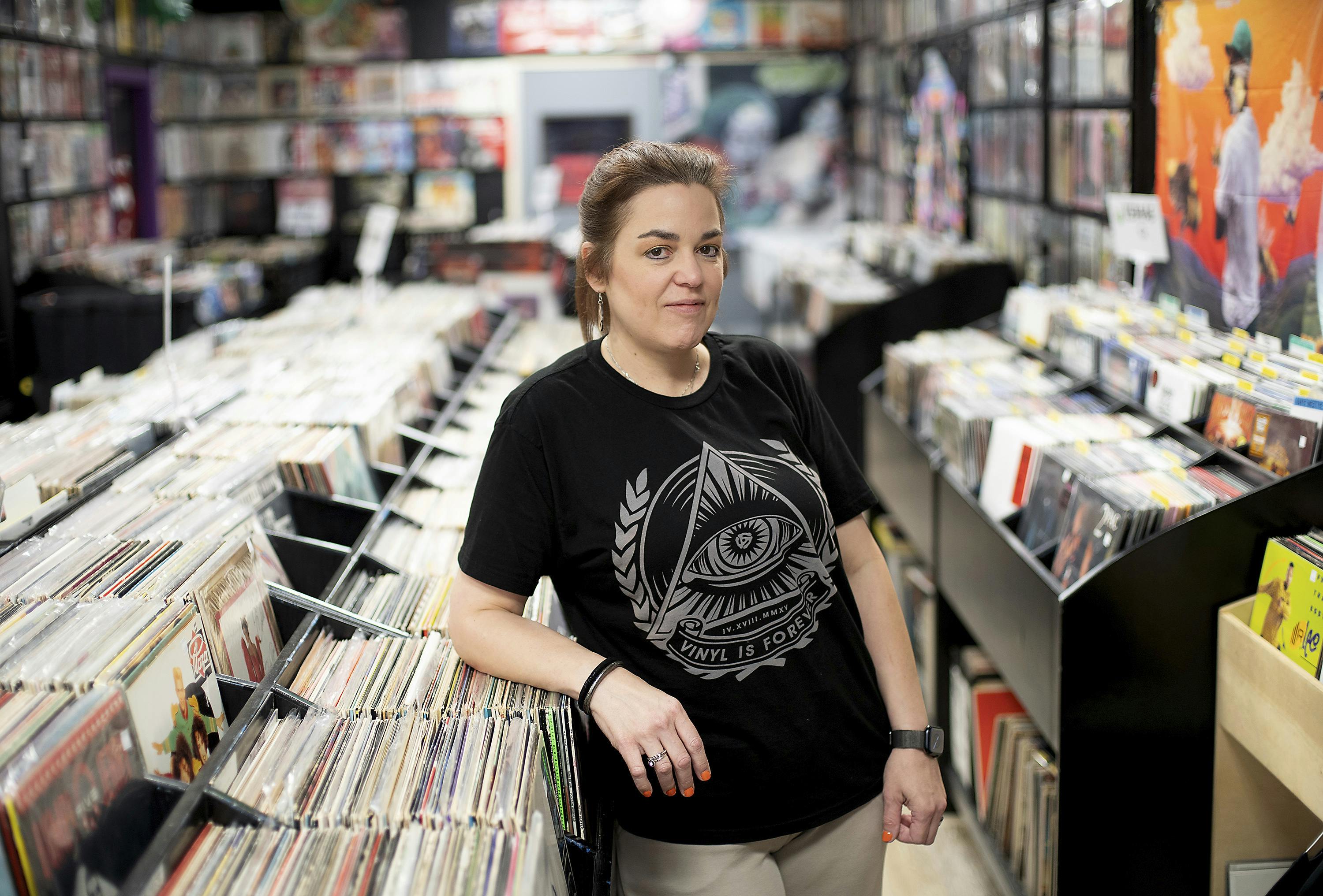 Nicole Mays, owner of Vinyl Heaven, in her store on Tuesday, April 11, 2023, in Dickinson, Texas. (Elizabeth Conley/Houston Chronicle via AP)