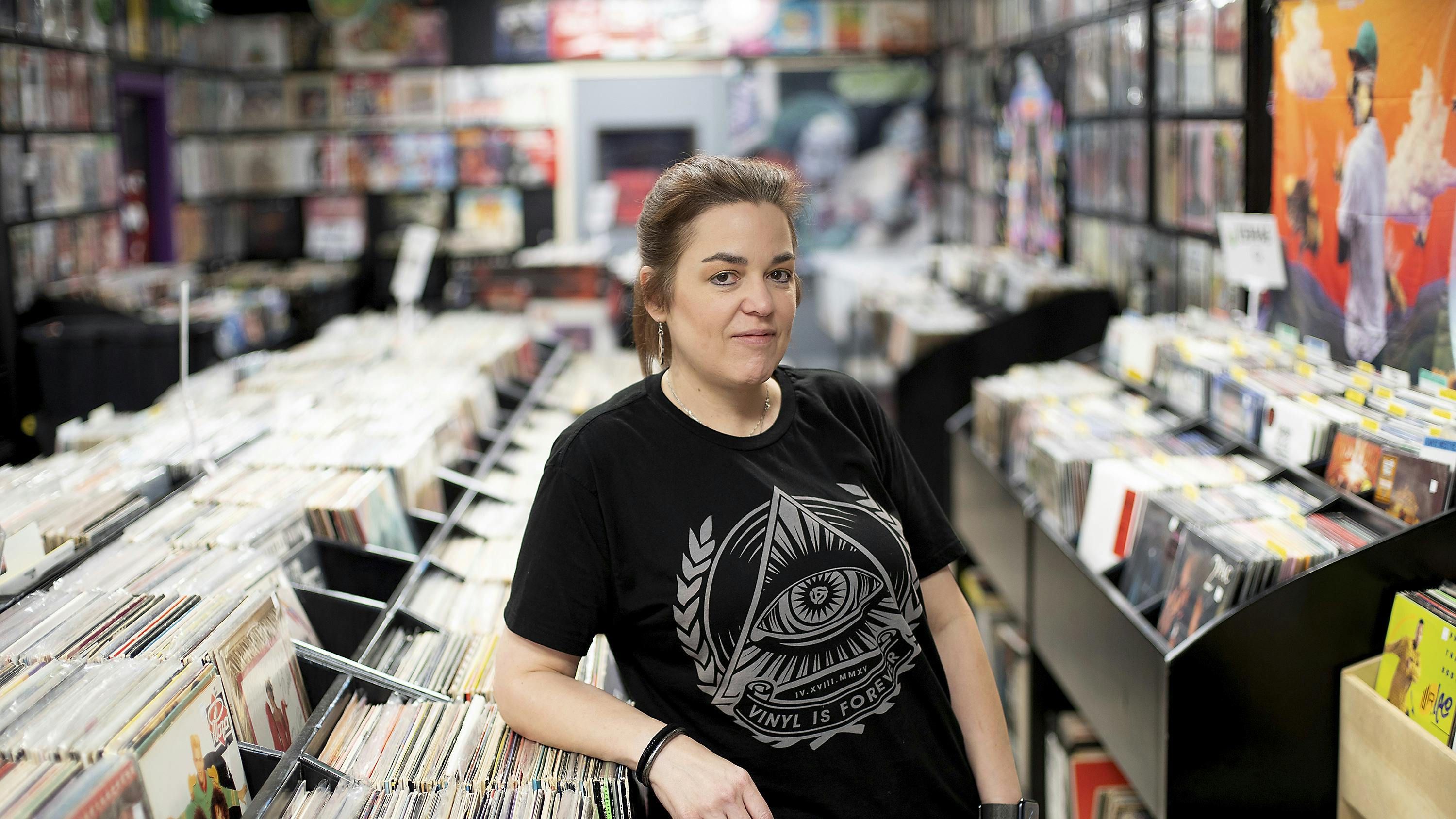 Nicole Mays, owner of Vinyl Heaven, in her store on Tuesday, April 11, 2023, in Dickinson, Texas. (Elizabeth Conley/Houston Chronicle via AP)
