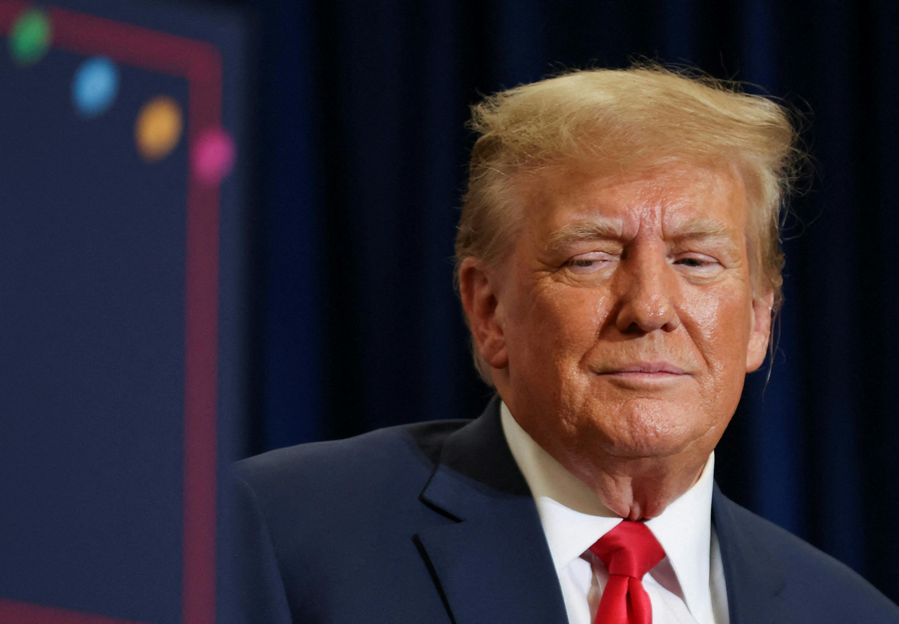 FILE PHOTO: Republican presidential candidate and former U.S. President Donald Trump attends a campaign event in Waterloo, Iowa, U.S. December 19, 2023. REUTERS/Scott Morgan/File Photo