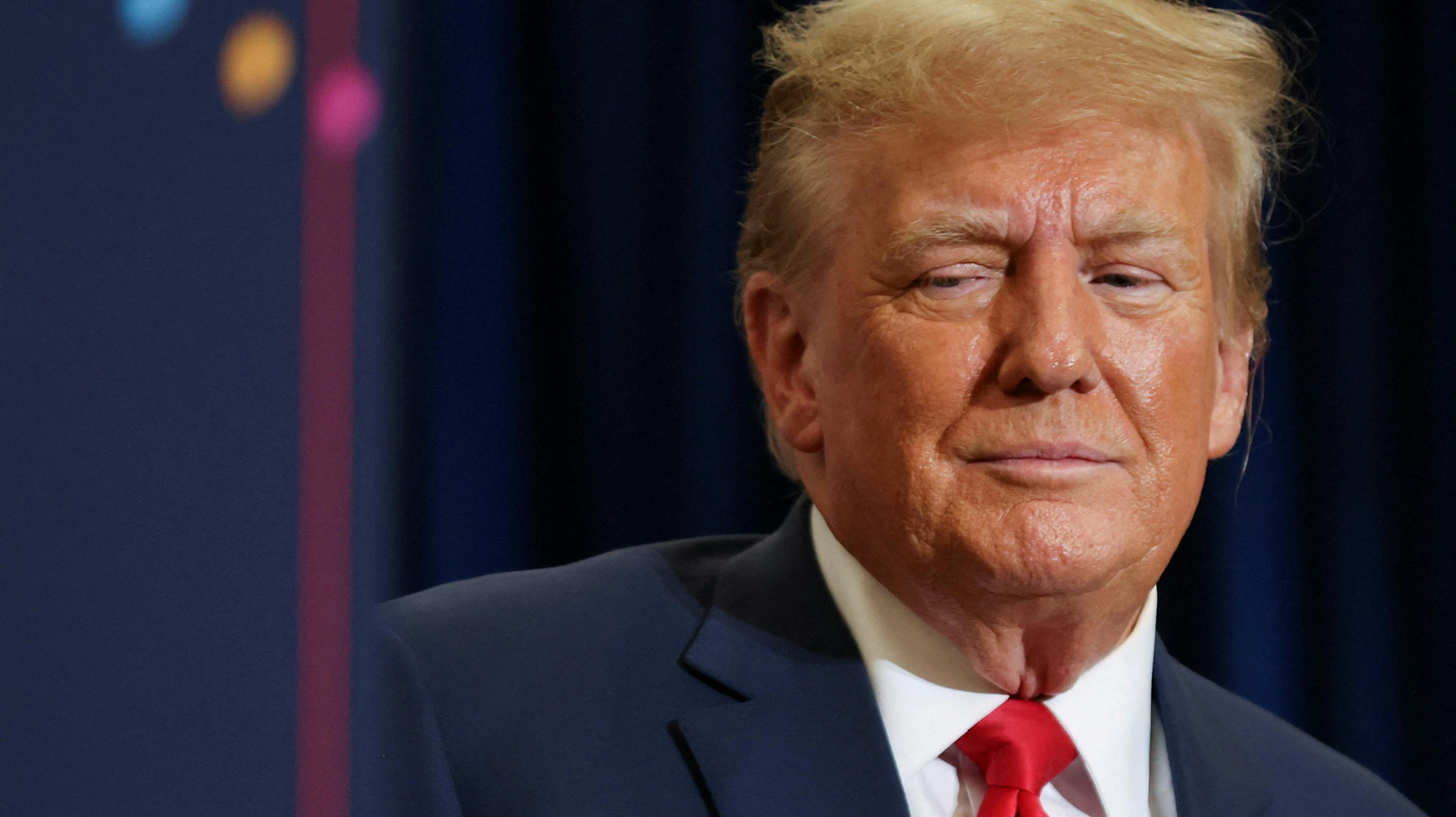FILE PHOTO: Republican presidential candidate and former U.S. President Donald Trump attends a campaign event in Waterloo, Iowa, U.S. December 19, 2023. REUTERS/Scott Morgan/File Photo