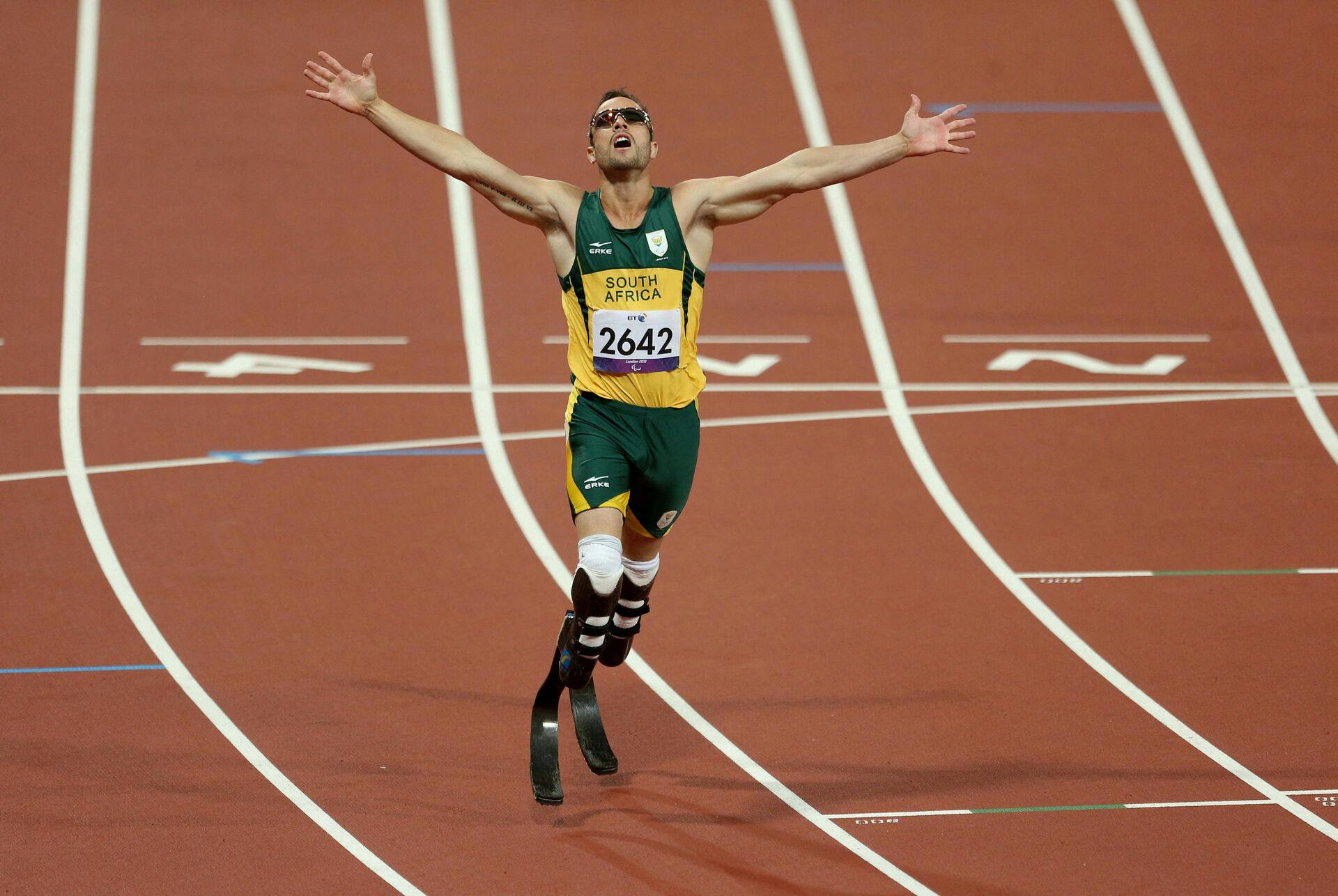 FILE PHOTO: Paralympics - London 2012 Paralympic Games - Olympic Stadium - 8/9/12 Athletics - Men's 400m - T44 Final - South Africa's Oscar Pistorius celebrates winning gold Mandatory Credit: Action Images / Steven Paston Livepic PLEASE NOTE: FOR EDITORIAL USE ONLY/File Photo