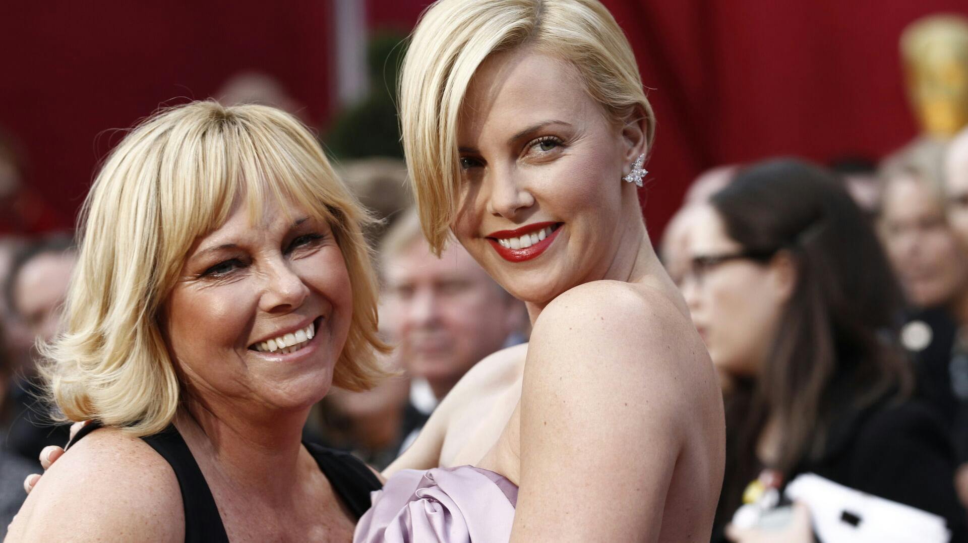 Charlize Theron and her mother Gerda arrive at the 82nd Academy Awards Sunday, March 7, 2010, in the Hollywood section of Los Angeles. (AP Photo/Matt Sayles)