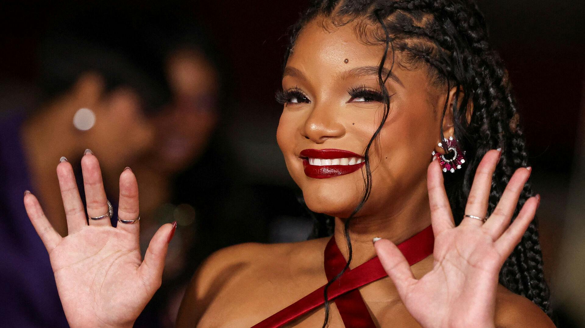 Cast member Halle Bailey poses as she attends a premiere for the film "The Color Purple" in Los Angeles, California, U.S., December 6, 2023. REUTERS/Mario Anzuoni