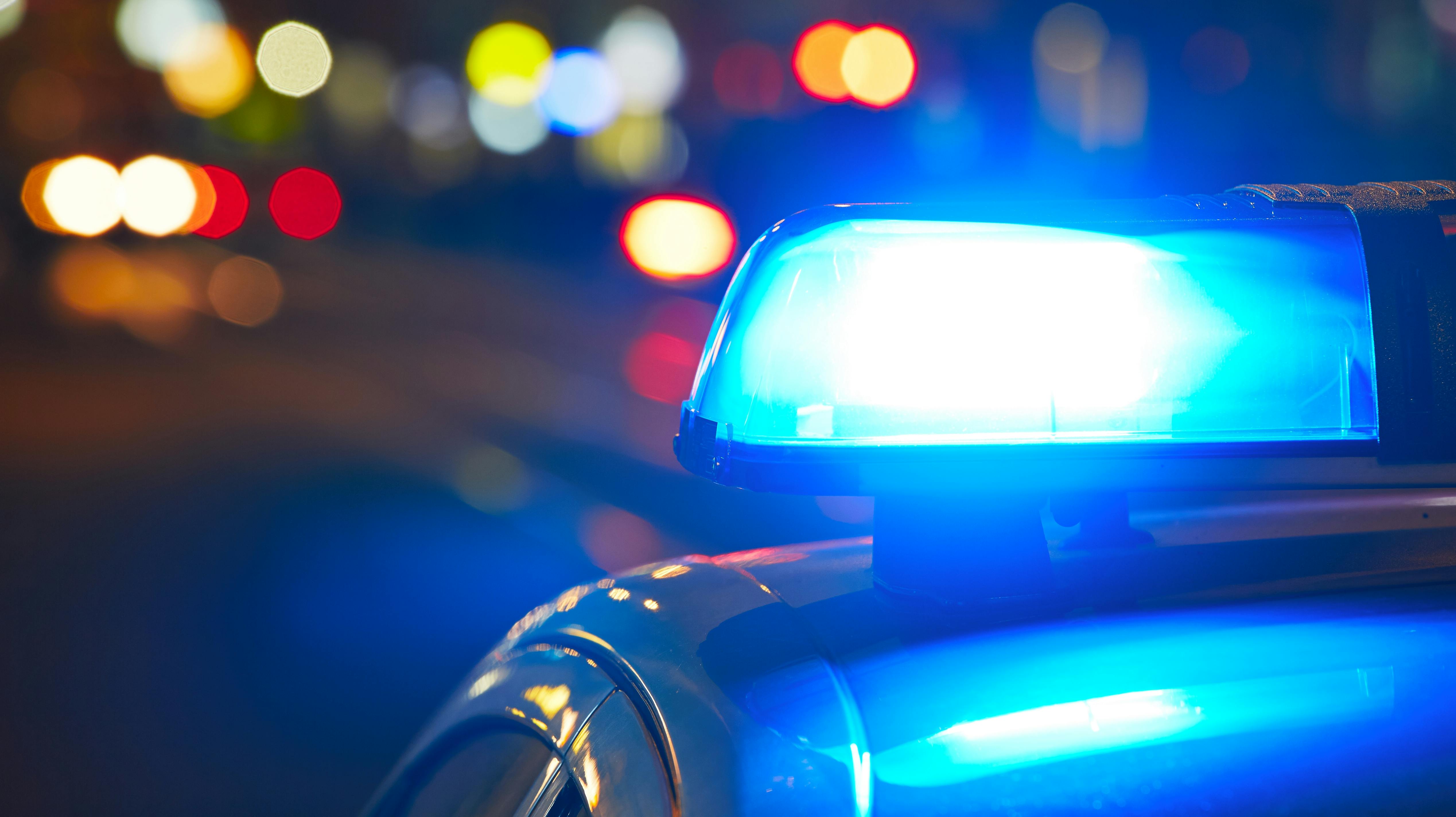 Police car on the street at night
