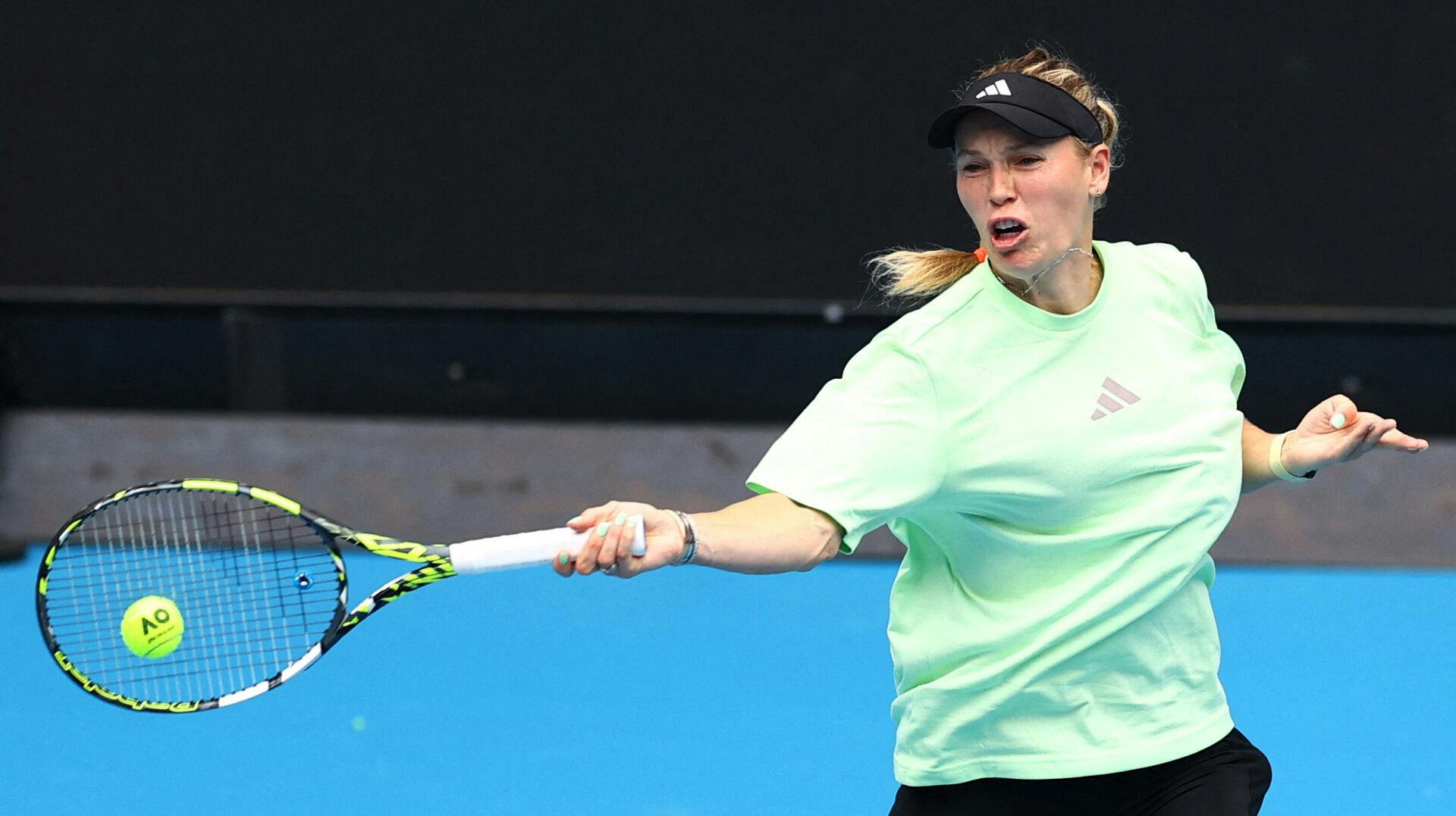 Tennis – Australian Open – Melbourne Park, Melbourne, Australia – January 13, 2024 Denmark's Caroline Wozniacki in action during practice ahead of the Australian Open REUTERS/Edgar Su