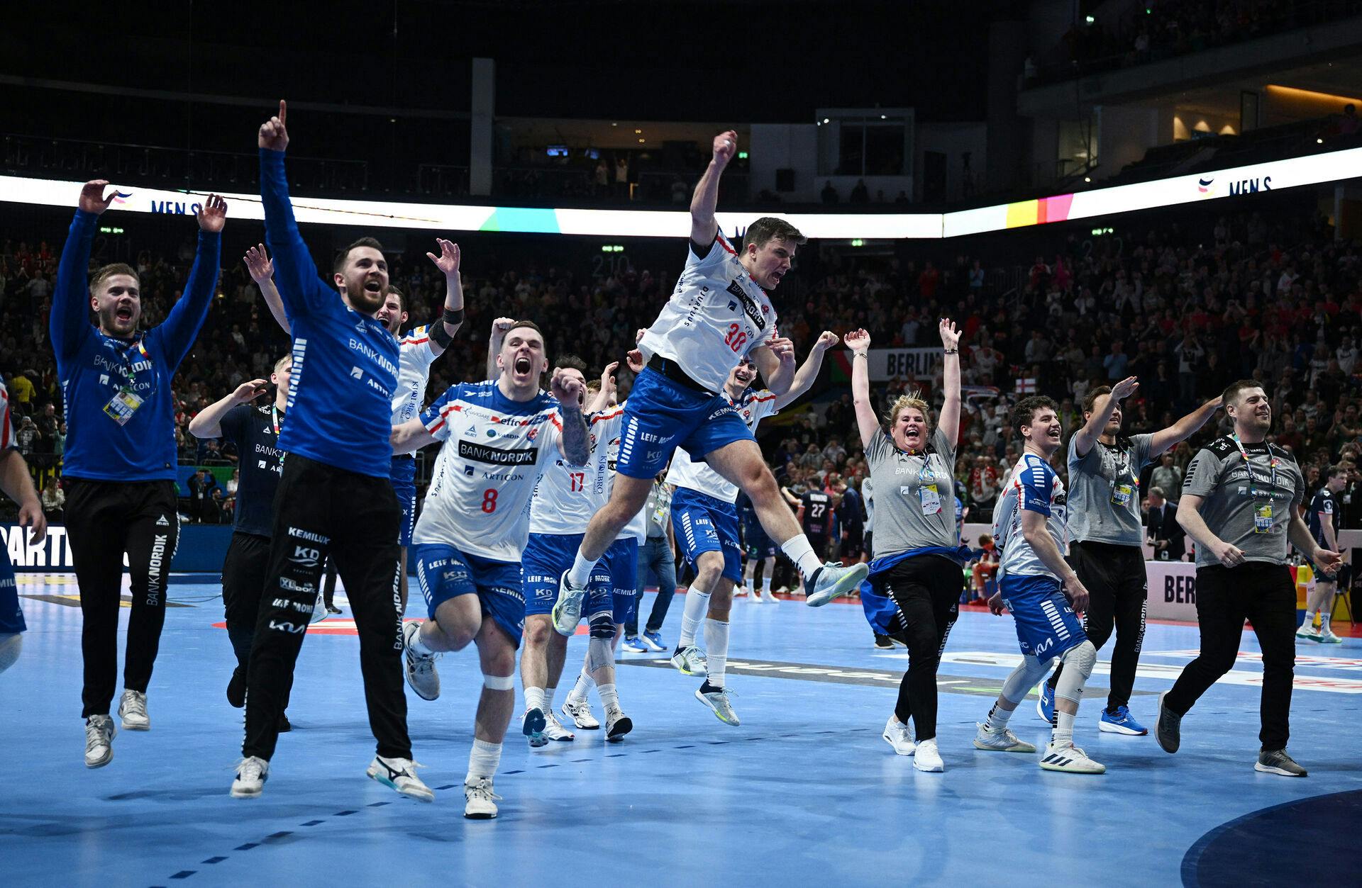 Handball - EHF 2024 Men's European Handball Championship - Preliminary Round - Group D - Faroe Islands v Norway - Mercedes-Benz Arena, Berlin, Germany - January 13, 2024 Faroe Islands players celebrate after the match REUTERS/Annegret Hilse