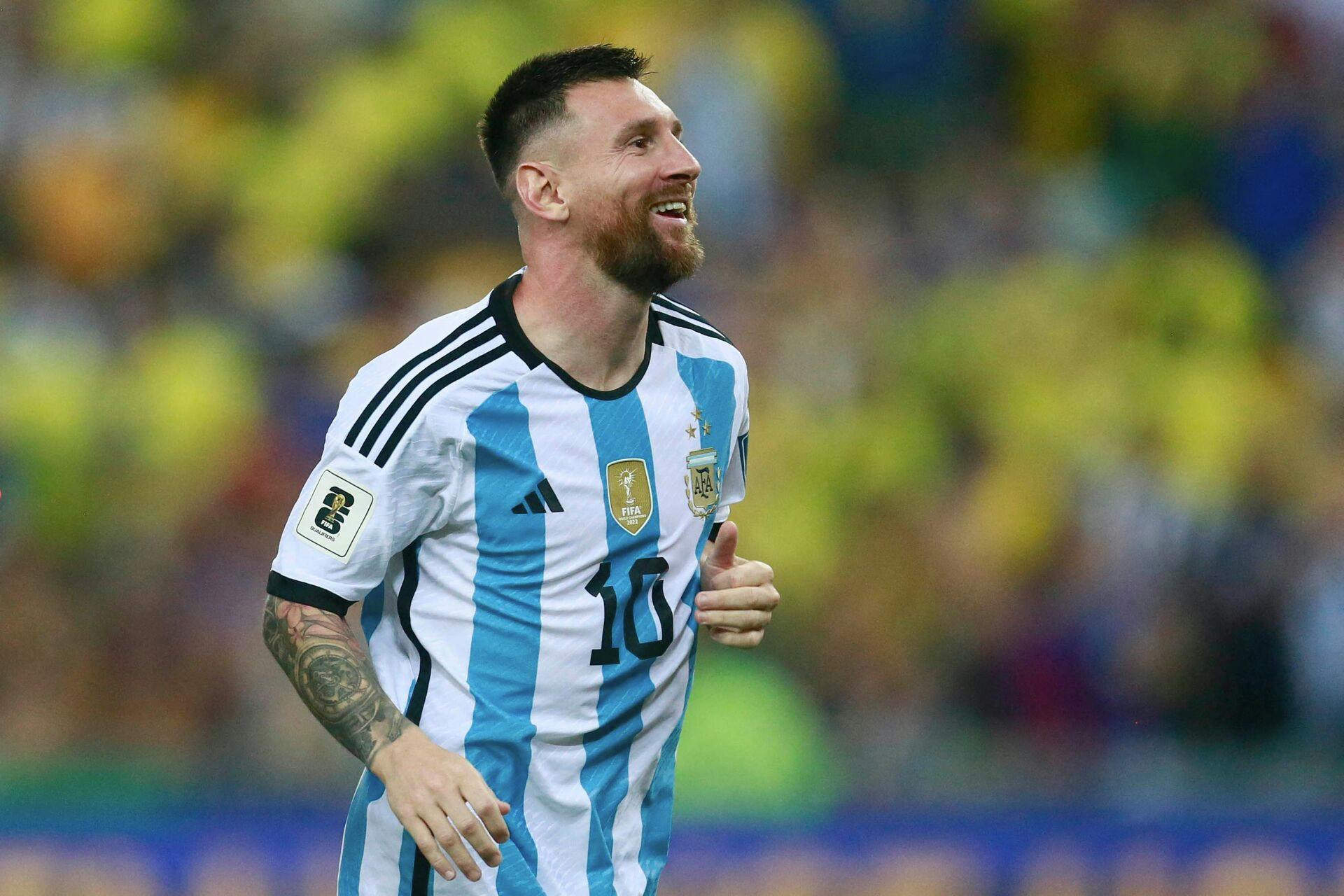 Argentina's forward Lionel Messi celebrates at the end of the 2026 FIFA World Cup South American qualification football match between Brazil and Argentina at Maracana Stadium in Rio de Janeiro, Brazil, on November 21, 2023. (Photo by DANIEL RAMALHO / AFP)