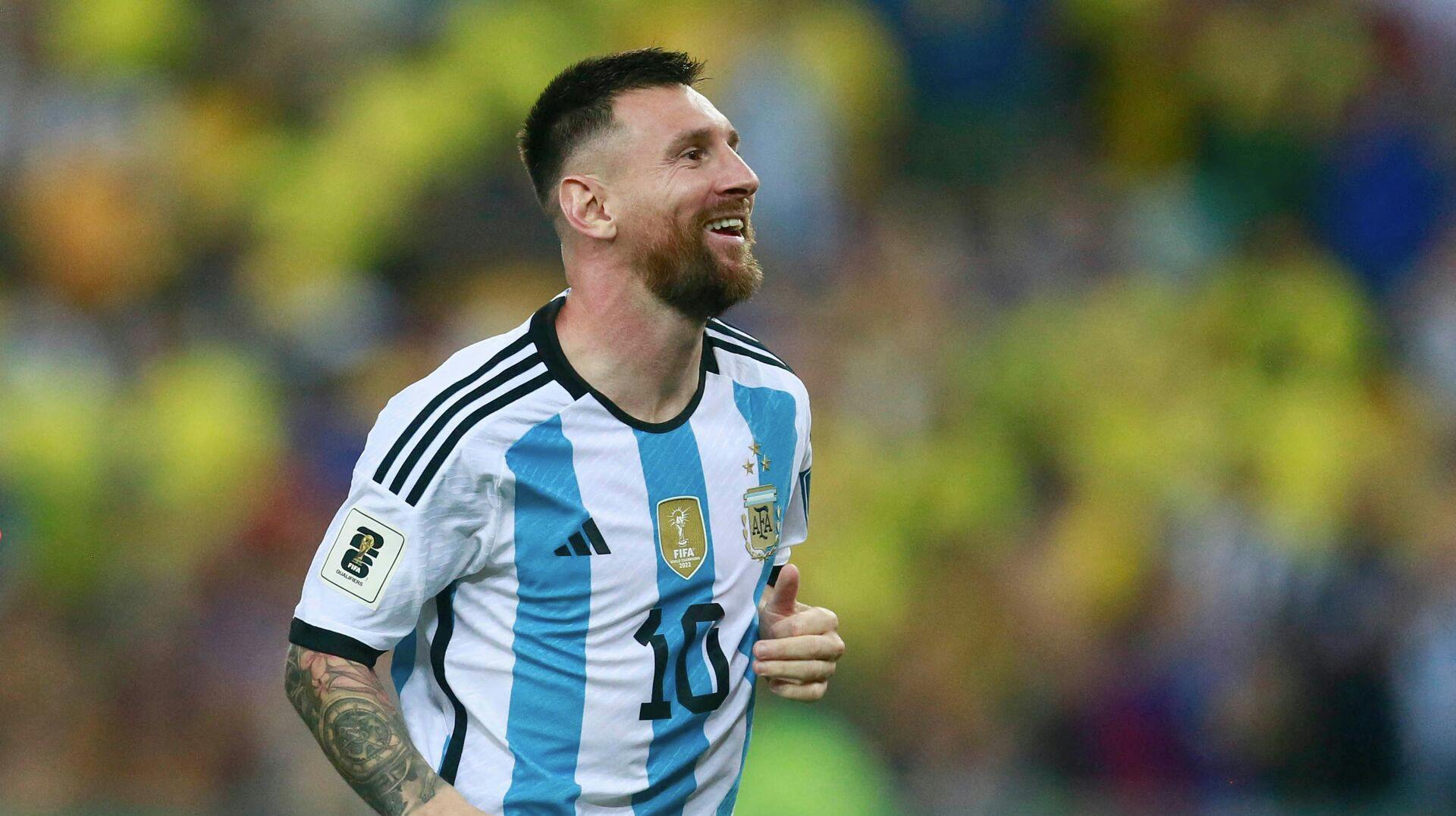 Argentina's forward Lionel Messi celebrates at the end of the 2026 FIFA World Cup South American qualification football match between Brazil and Argentina at Maracana Stadium in Rio de Janeiro, Brazil, on November 21, 2023. (Photo by DANIEL RAMALHO / AFP)