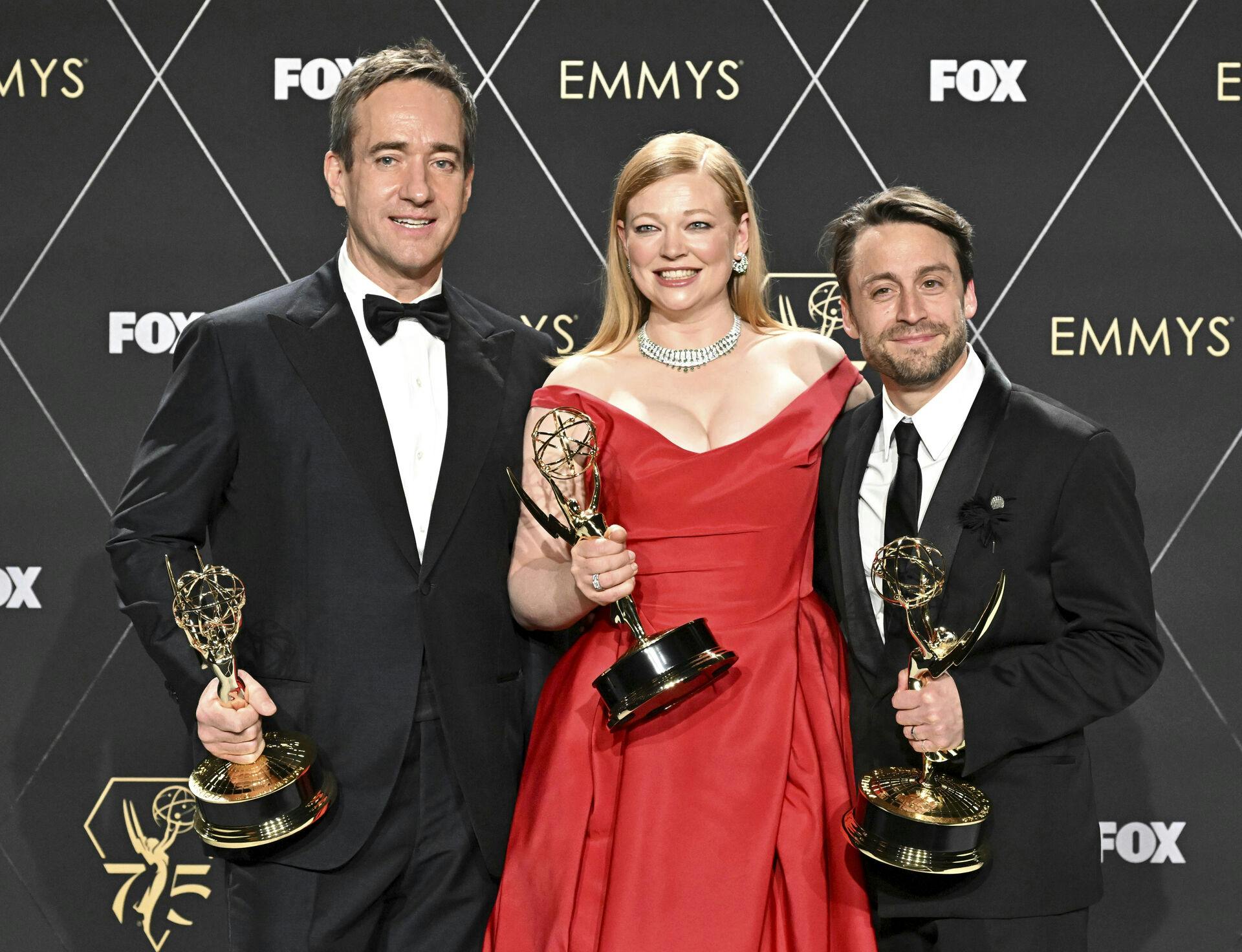 Matthew Macfadyen, Sarah Snook, Kieran Culkin pose in the press room with the Emmy for outstanding drama series for "Succession" at the 75th Emmy Awards on Monday, Jan. 15, 2024 at the Peacock Theater in Los Angeles. (Photo by Dan Steinberg/Invision for the Television Academy/AP Images)
