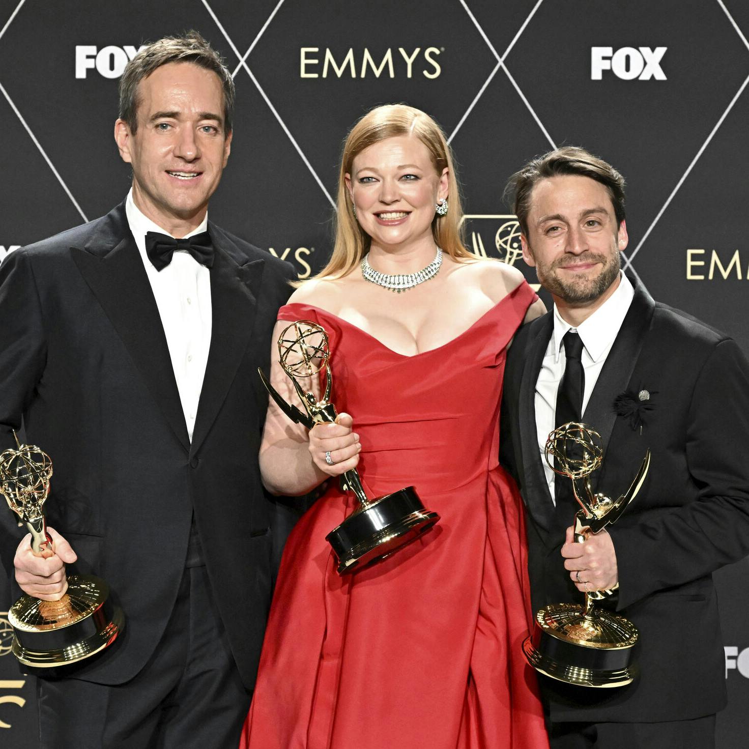 Matthew Macfadyen, Sarah Snook, Kieran Culkin pose in the press room with the Emmy for outstanding drama series for "Succession" at the 75th Emmy Awards on Monday, Jan. 15, 2024 at the Peacock Theater in Los Angeles. (Photo by Dan Steinberg/Invision for the Television Academy/AP Images)