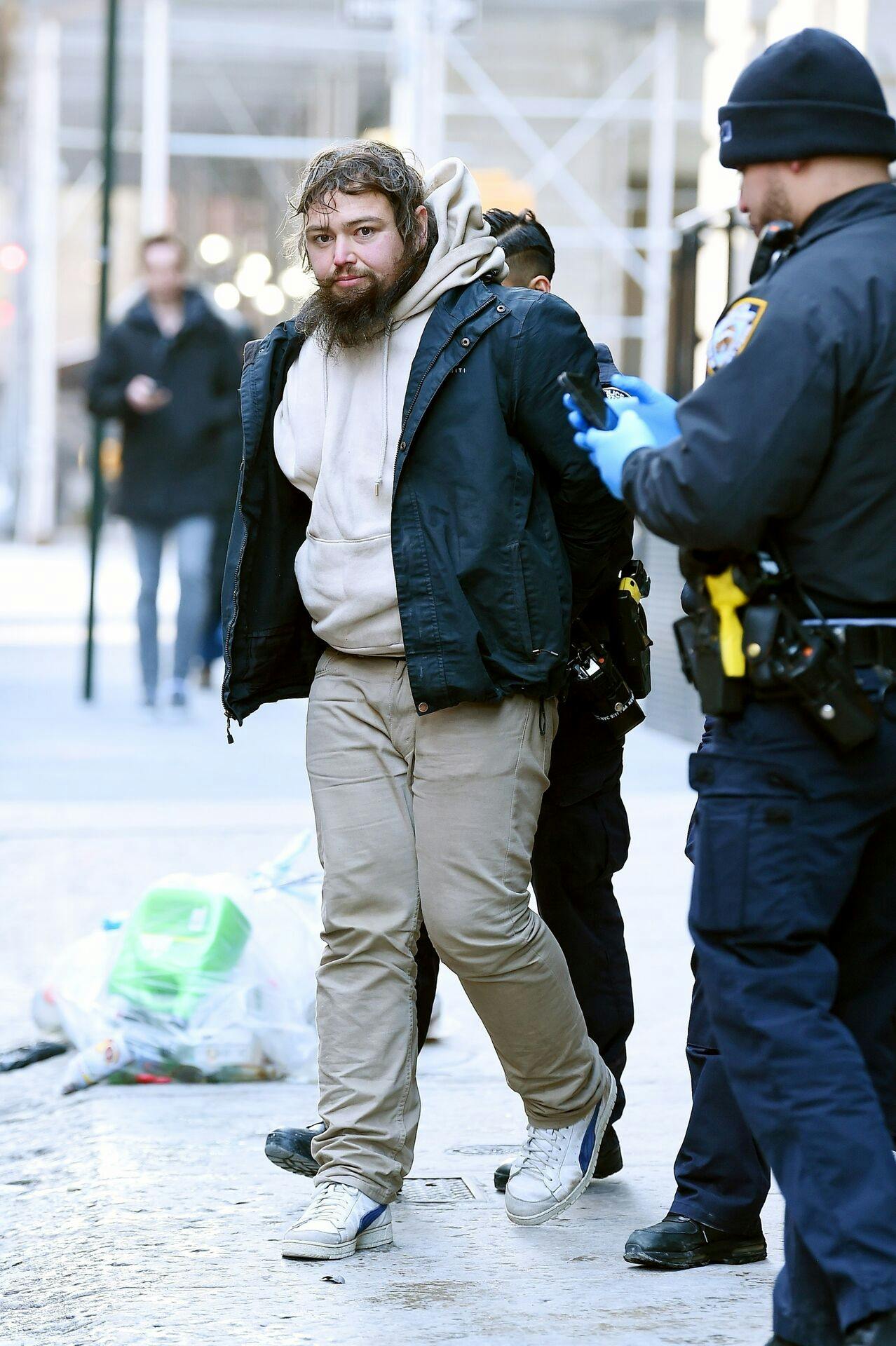 New York, NY - Taylor Swift's stalker gets arrested outside of her Tribeca apartment after trying to get into the building. Police called him "David" during the arrest. The man was pictured trying to get into the apartment and then seen getting arrested by NYPD! Pictured: Stalker BACKGRID USA 20 JANUARY 2024 USA: +1 310 798 9111 / usasales@backgrid.com UK: +44 208 344 2007 / uksales@backgrid.com *UK Clients - Pictures Containing Children Please Pixelate Face Prior To Publication*