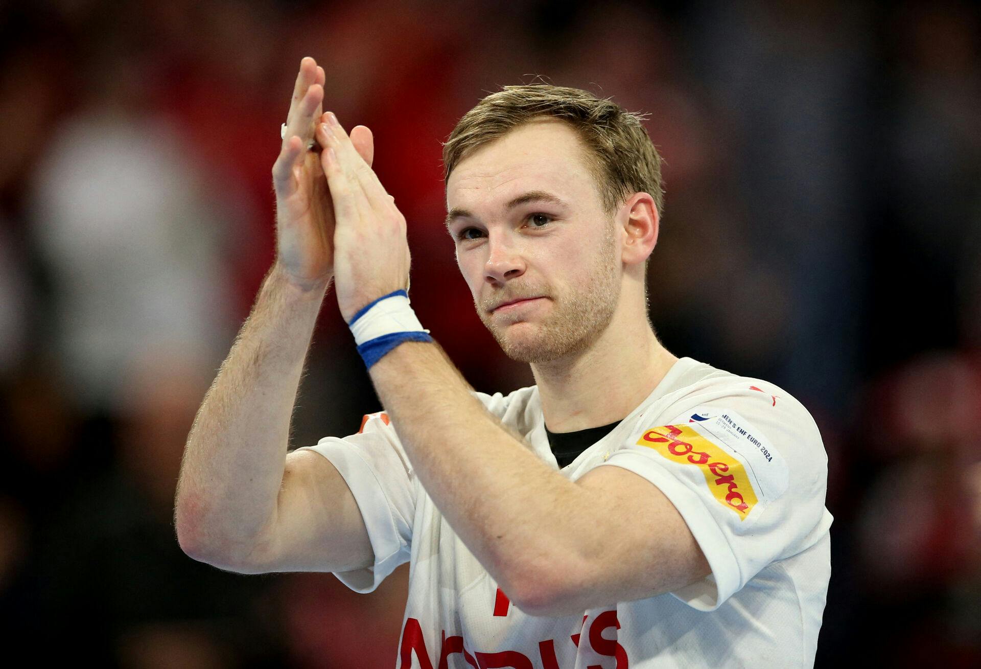 Handball - EHF 2024 Men's European Handball Championship - Main Round - Norway v Denmark - Barclays Arena, Hamburg, Germany - January 21, 2024 Denmark's Mathias Gidsel applauds fans after the match REUTERS/Cathrin Mueller