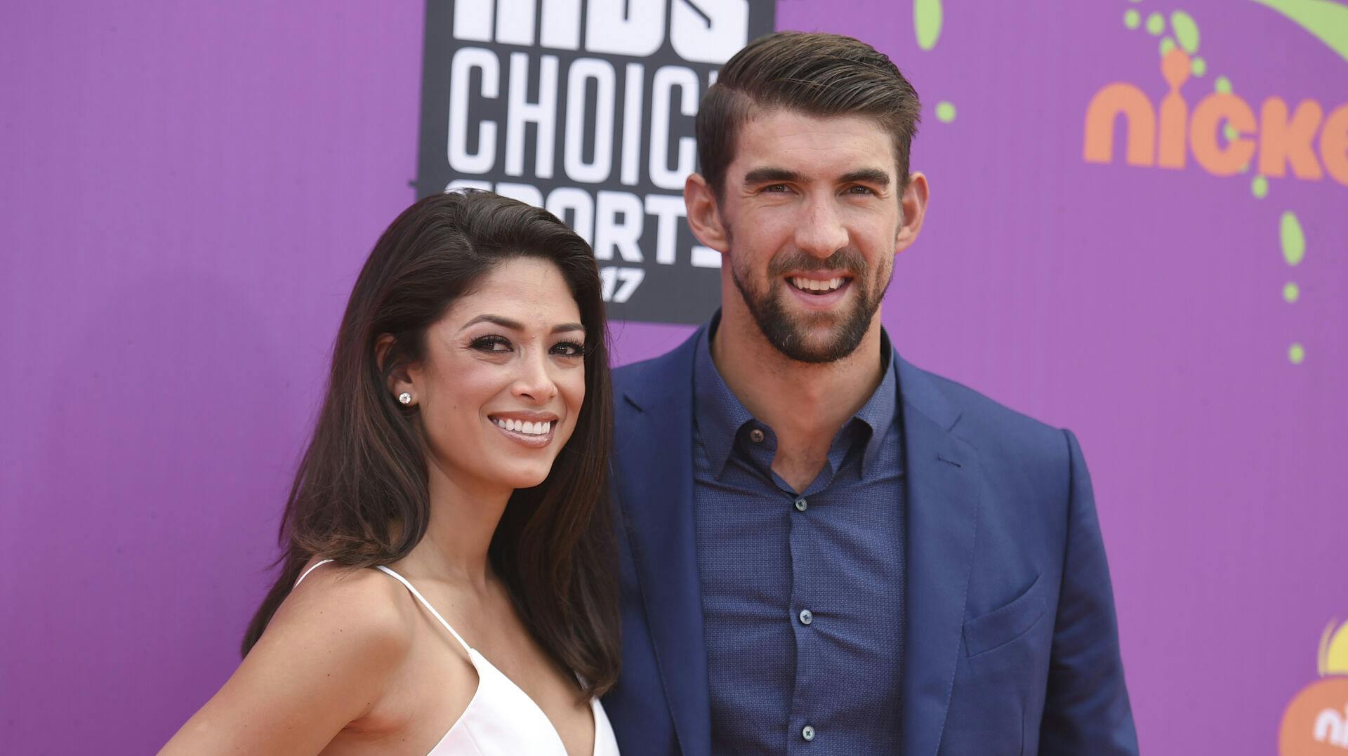 Michael Phelps og Nicole Phelps er i babylykke for fjerde gang.