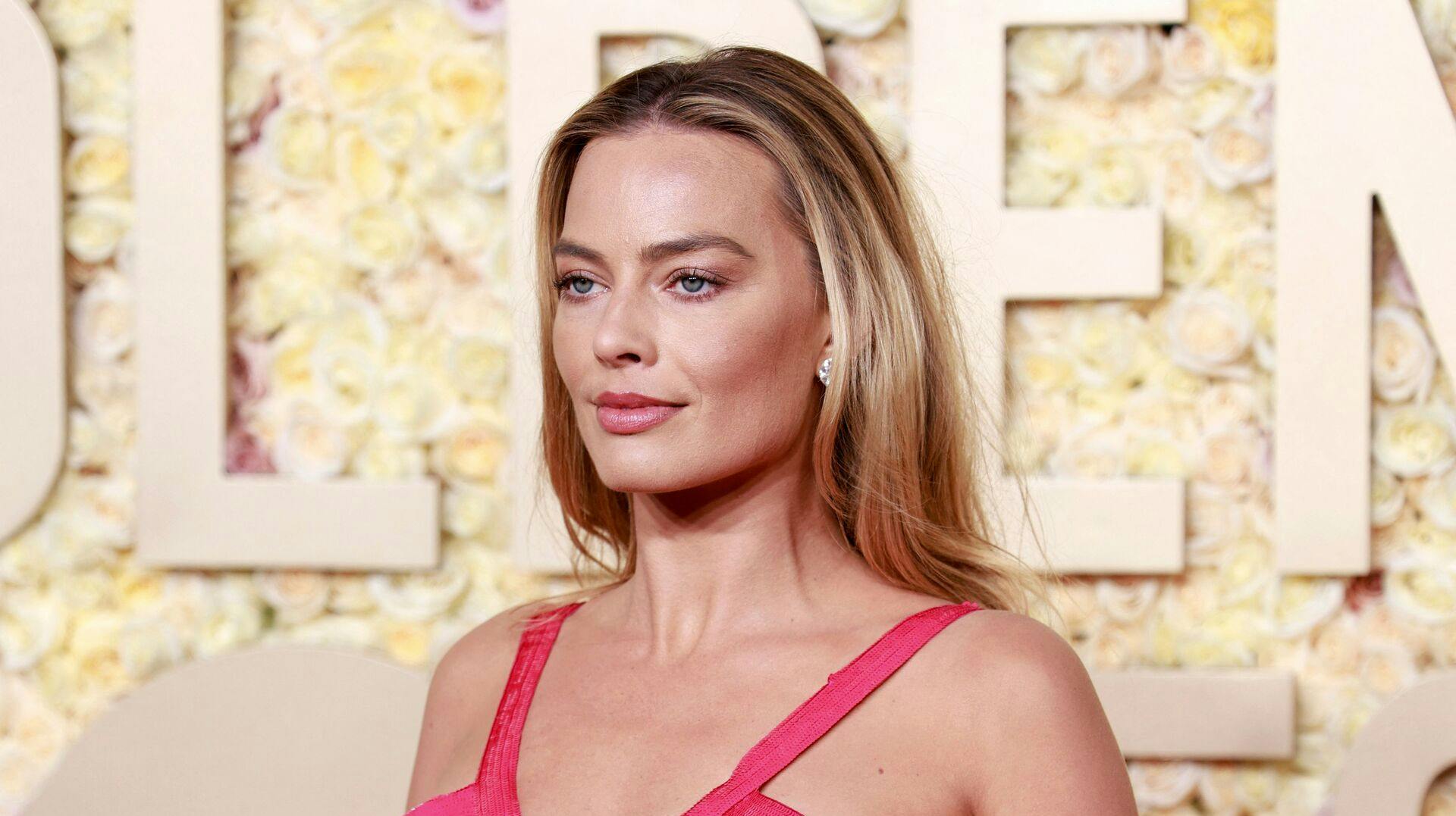 Australian actress Margot Robbie arrives for the 81st annual Golden Globe Awards at The Beverly Hilton hotel in Beverly Hills, California, on January 7, 2024. (Photo by Michael TRAN / AFP)
