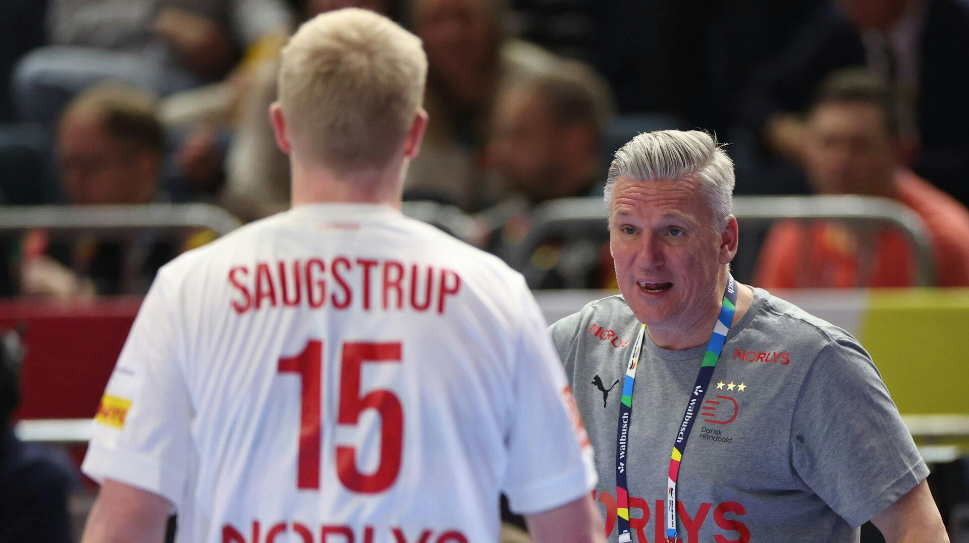 Magnus Saugstrup har lørdag fortsat smerter i ryggen, men han håber på at være med til EM-finalen.