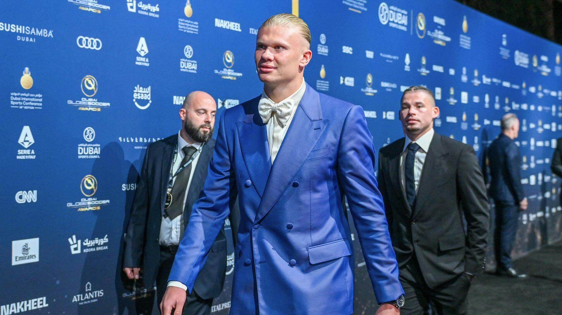 Manchester City's Norwegian forward Erling Haaland arrives to attend the 18th edition of the Globe Soccer Awards in the Gulf Emirate of Dubai on January 19, 2024. (Photo by Ryan LIM / AFP)