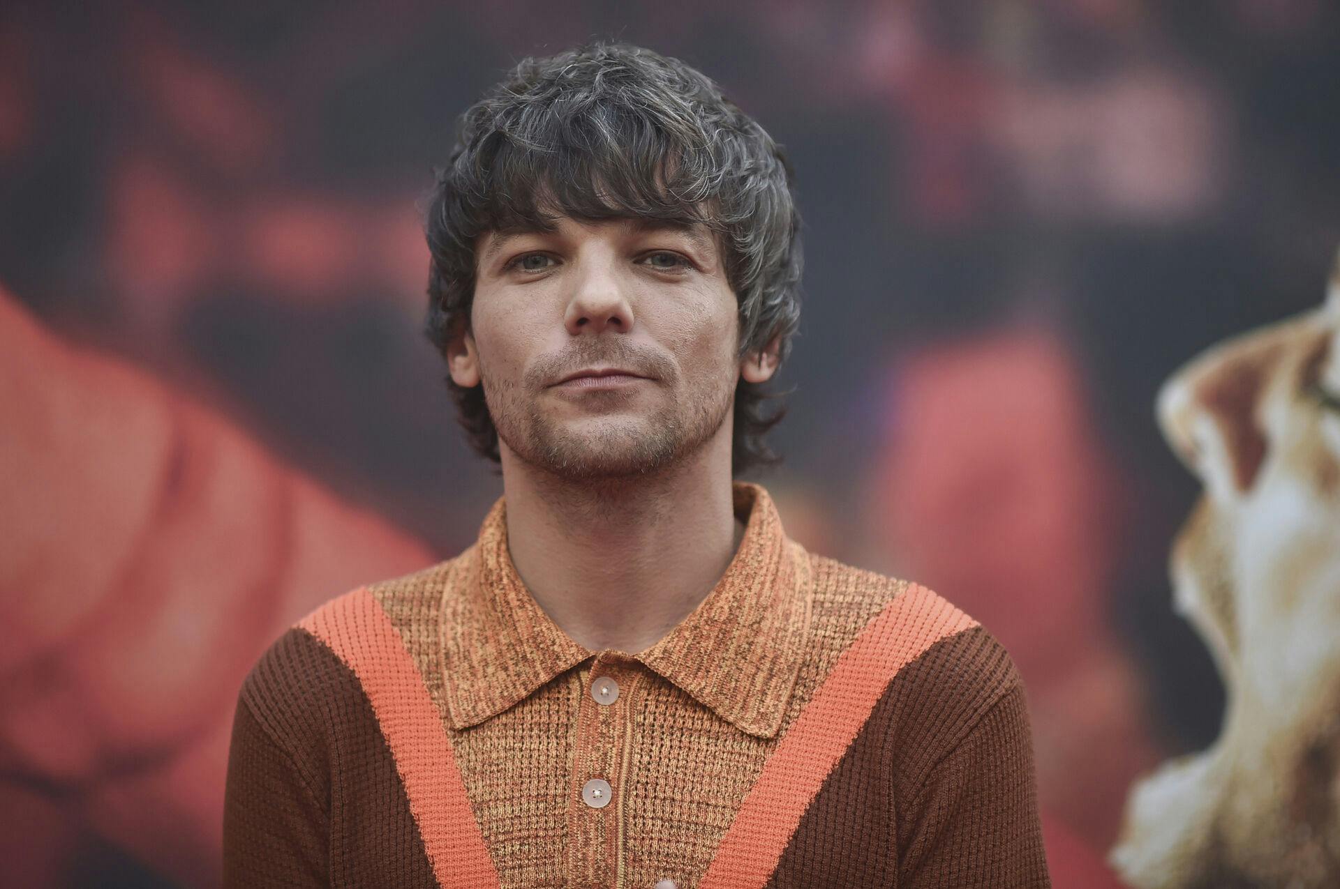 Louis Tomlinson arrives at the premiere of "All of Those Voices" on Saturday, May 13, 2023, at the Ford Amphitheater in Los Angeles. (Photo by Richard Shotwell/Invision/AP)