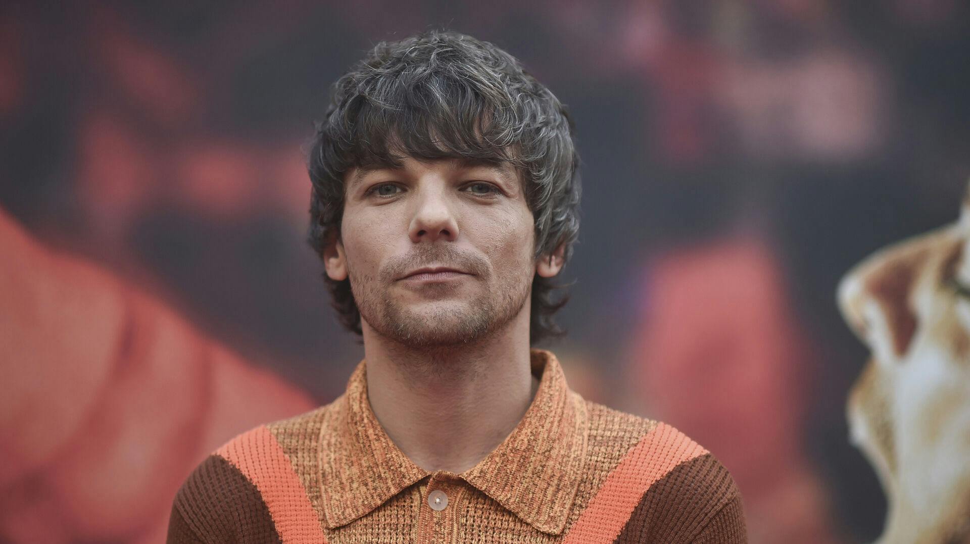 Louis Tomlinson arrives at the premiere of "All of Those Voices" on Saturday, May 13, 2023, at the Ford Amphitheater in Los Angeles. (Photo by Richard Shotwell/Invision/AP)