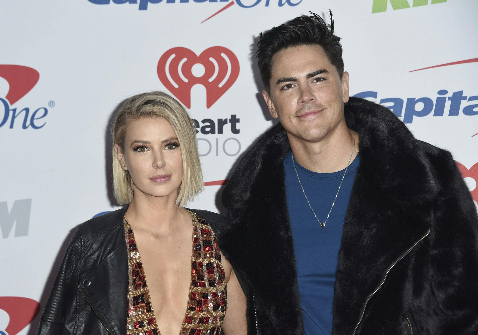 Ariana Madix, left, and Tom Sandoval arrive at Jingle Ball at The Forum on Friday, Dec. 1, 2017, in Inglewood, Calif. (Photo by Richard Shotwell/Invision/AP)
