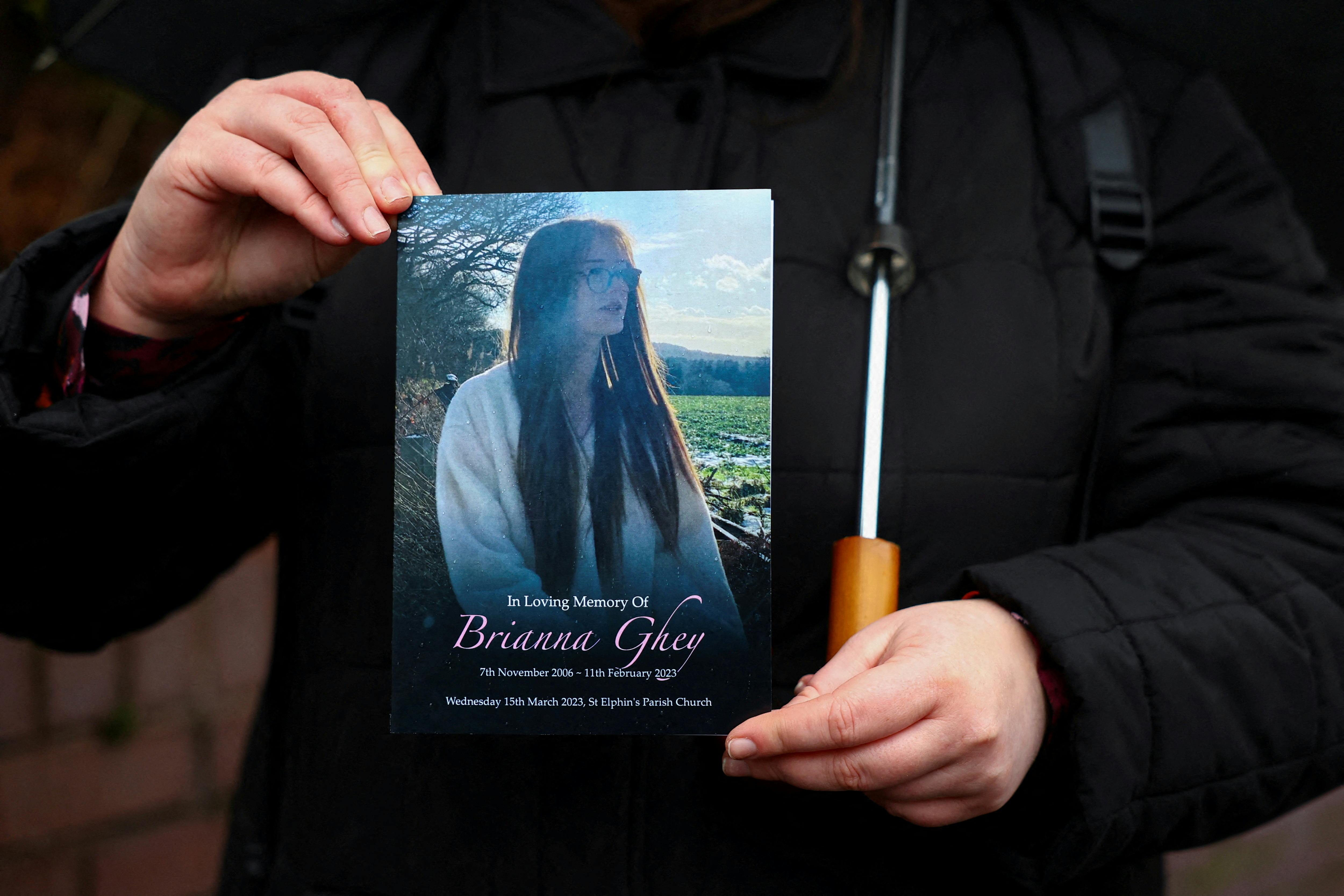 FILE PHOTO: A mourner holds the order of service for the funeral of Brianna Ghey, a 16-year-old transgender girl, in Warrington, Britain March 15, 2023. REUTERS/Molly Darlington/File Photo