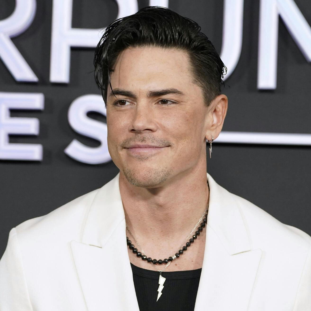 Tom Sandoval arrives at the season 11 premiere of "Vanderpump Rules, " Wednesday, Jan. 17, 2024, at The Hollywood Palladium in Los Angeles. (Photo by Jordan Strauss/Invision/AP)