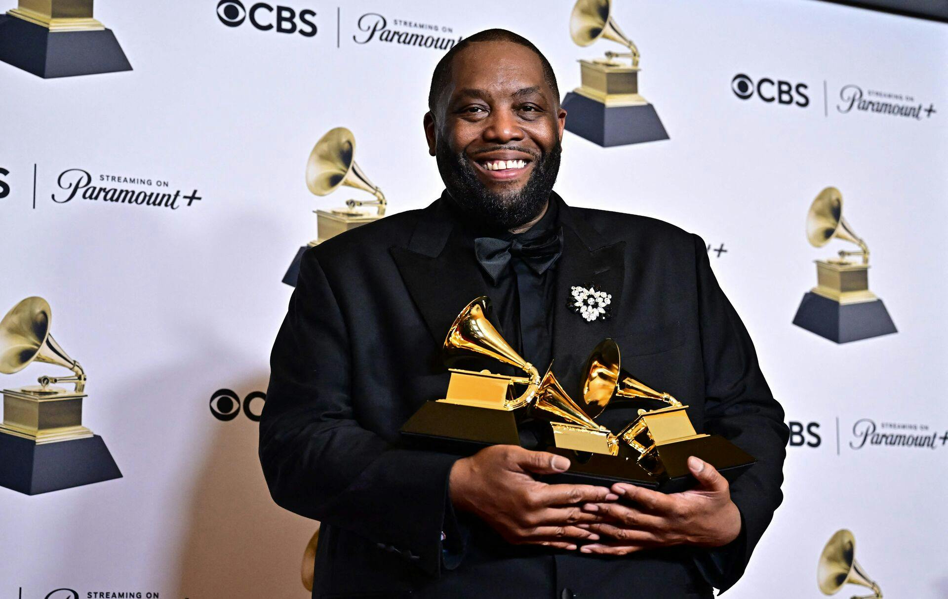 US rapper Killer Mike poses in the press room with the Grammy for Best Rap Performance, Best Rap Album and Best Rap Song during the 66th Annual Grammy Awards at the Crypto.com Arena in Los Angeles on February 4, 2024. (Photo by Frederic J. Brown / AFP)