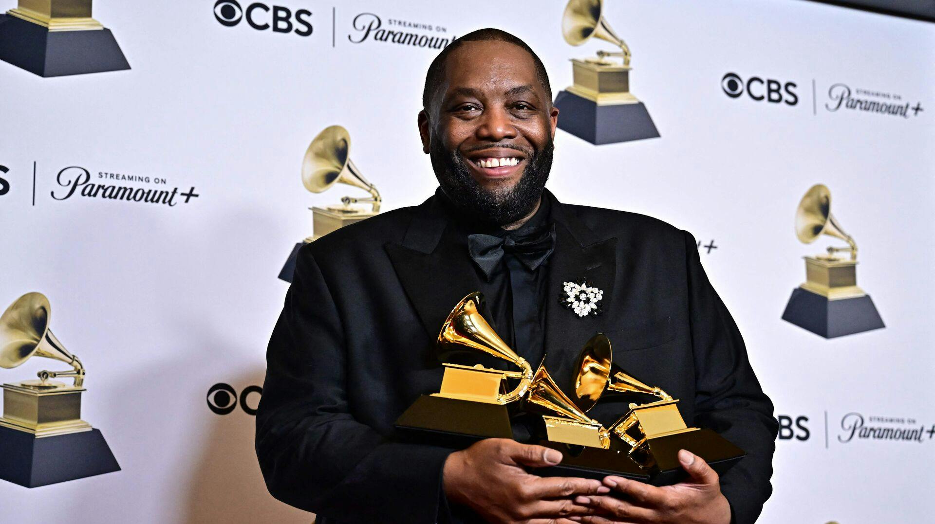 US rapper Killer Mike poses in the press room with the Grammy for Best Rap Performance, Best Rap Album and Best Rap Song during the 66th Annual Grammy Awards at the Crypto.com Arena in Los Angeles on February 4, 2024. (Photo by Frederic J. Brown / AFP)