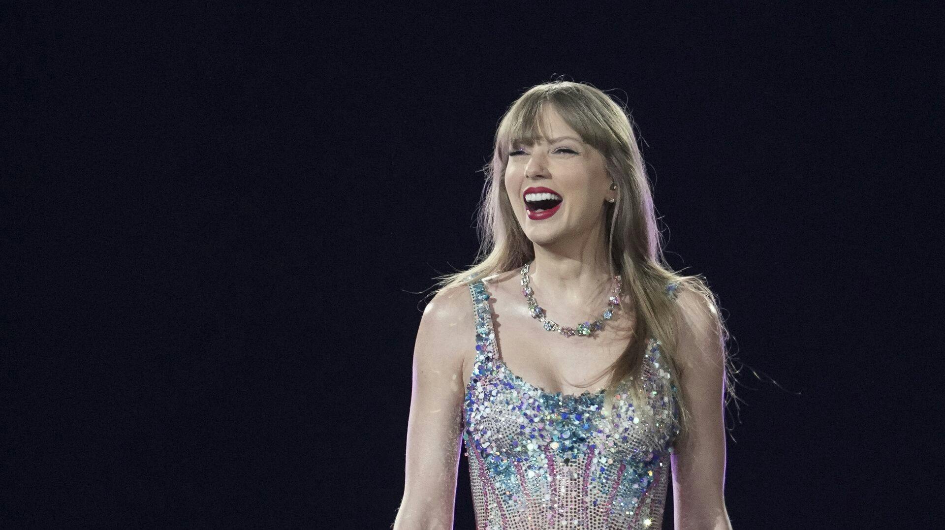 Taylor Swift performs as part of the "Eras Tour" at the Tokyo Dome, Wednesday, Feb. 7, 2024, in Tokyo. (AP Photo/Toru Hanai)