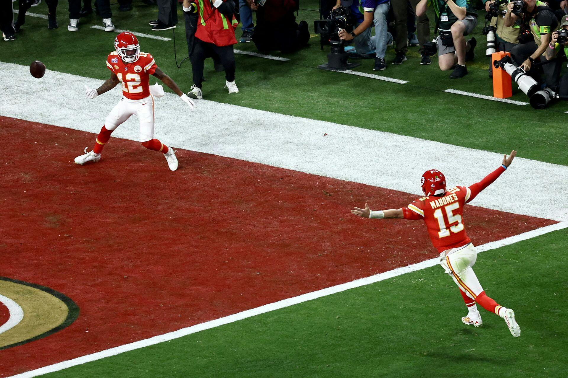LAS VEGAS, NEVADA - FEBRUARY 11: Mecole Hardman Jr. #12 of the Kansas City Chiefs celebrates with Patrick Mahomes #15 after scoring the game-winning touchdown in overtime to defeat the San Francisco 49ers 25-22 during Super Bowl LVIII at Allegiant Stadium on February 11, 2024 in Las Vegas, Nevada. Tim Nwachukwu/Getty Images/AFP (Photo by Tim Nwachukwu / GETTY IMAGES NORTH AMERICA / Getty Images via AFP)