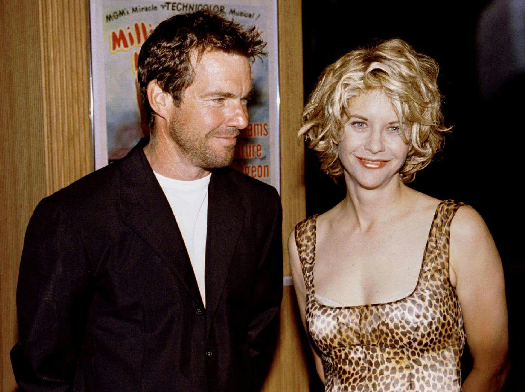 Meg Ryan (R) poses with her husband, actor Dennis Quaid, in this July 8, 1996 file photo. Ryan and Quaid, considered one of Hollywood's steadier couples, have separated after nine years of marriage, their publicist said on Thursday. There was no word on whether they had plans to divorce.